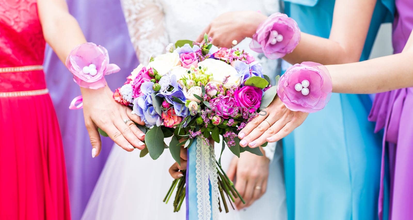 Close up of bride and bridesmaids bouquet by Satura86