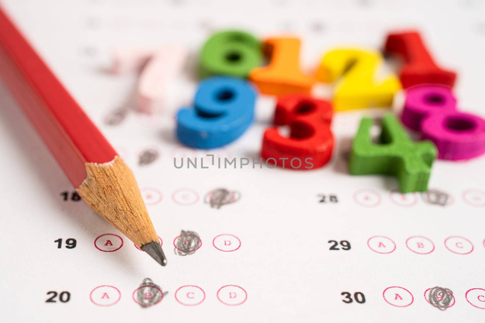 Math number and pencil on answer sheet paper, Education study testing learning teach concept.