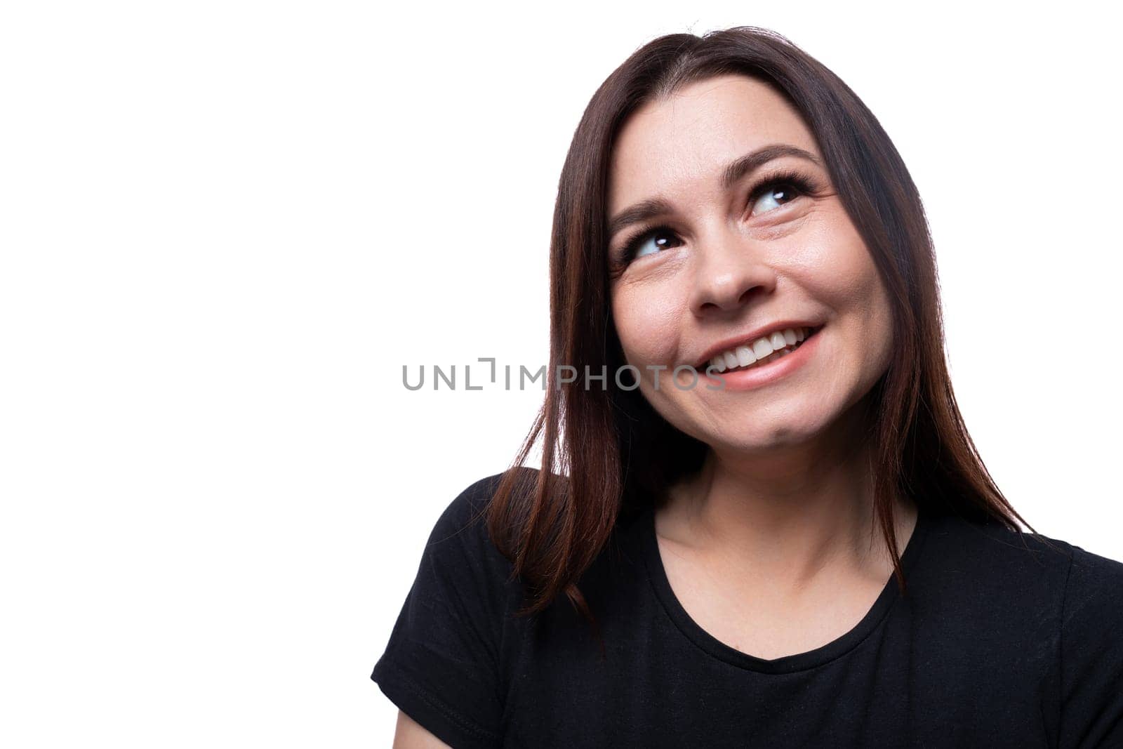 Young beautiful woman with brown eyes wearing a black T-shirt.