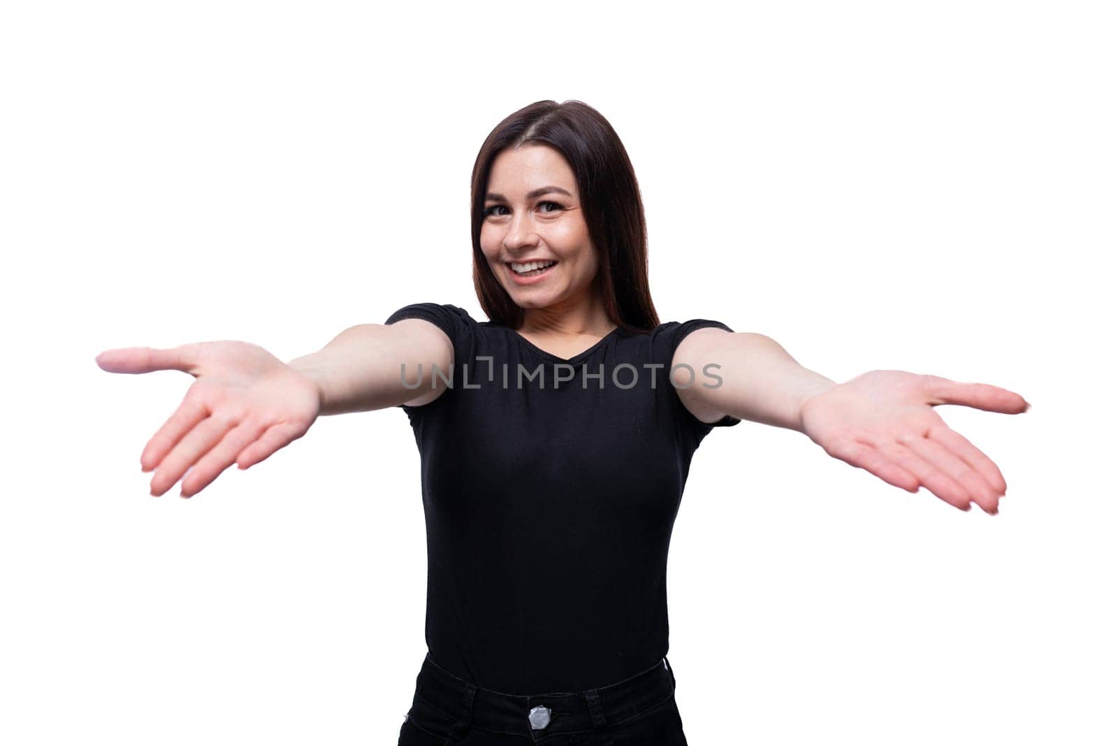 Young friendly woman smiling at the camera against a background of copy space.