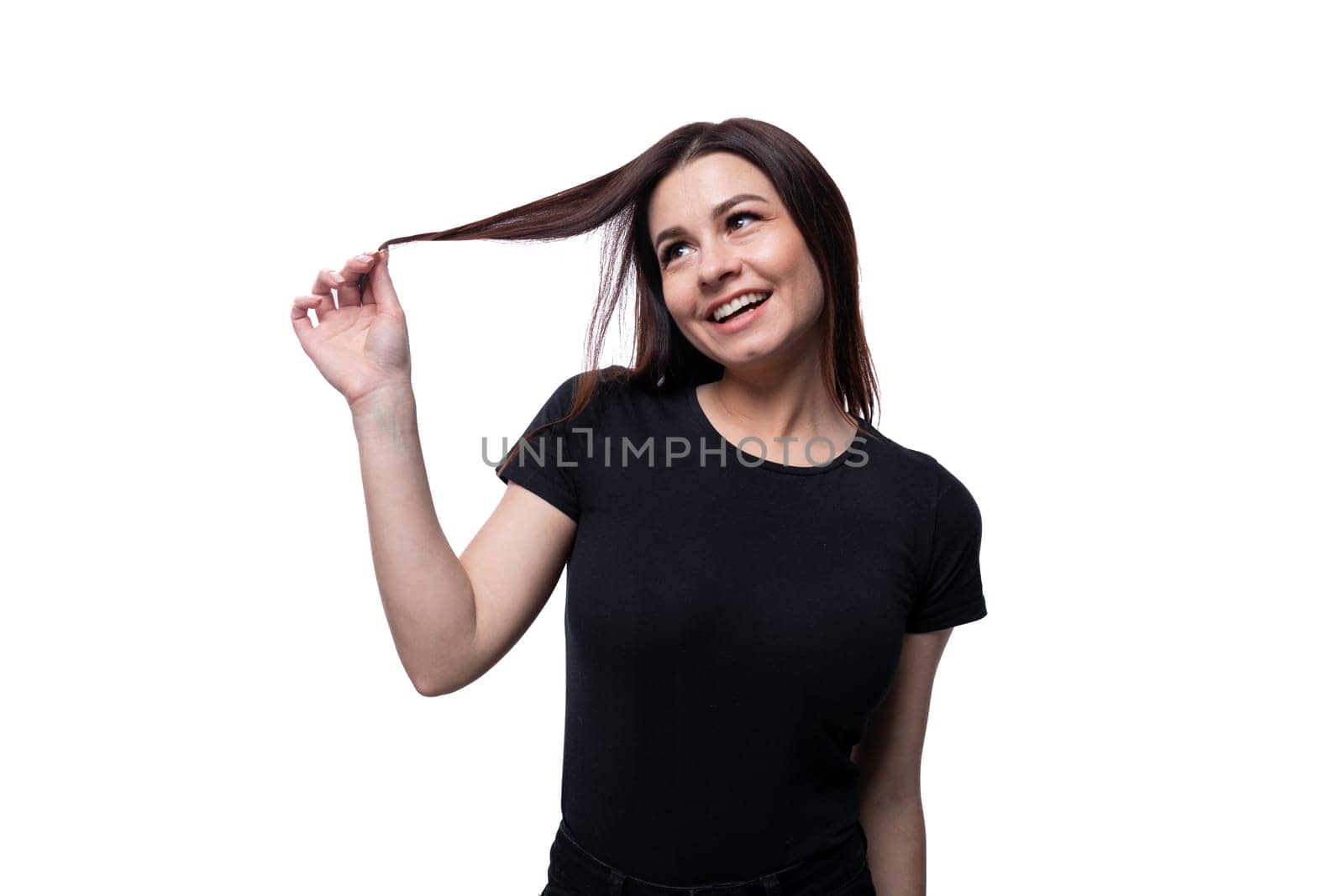 Young slender brunette woman with straight short hair wearing a black T-shirt.