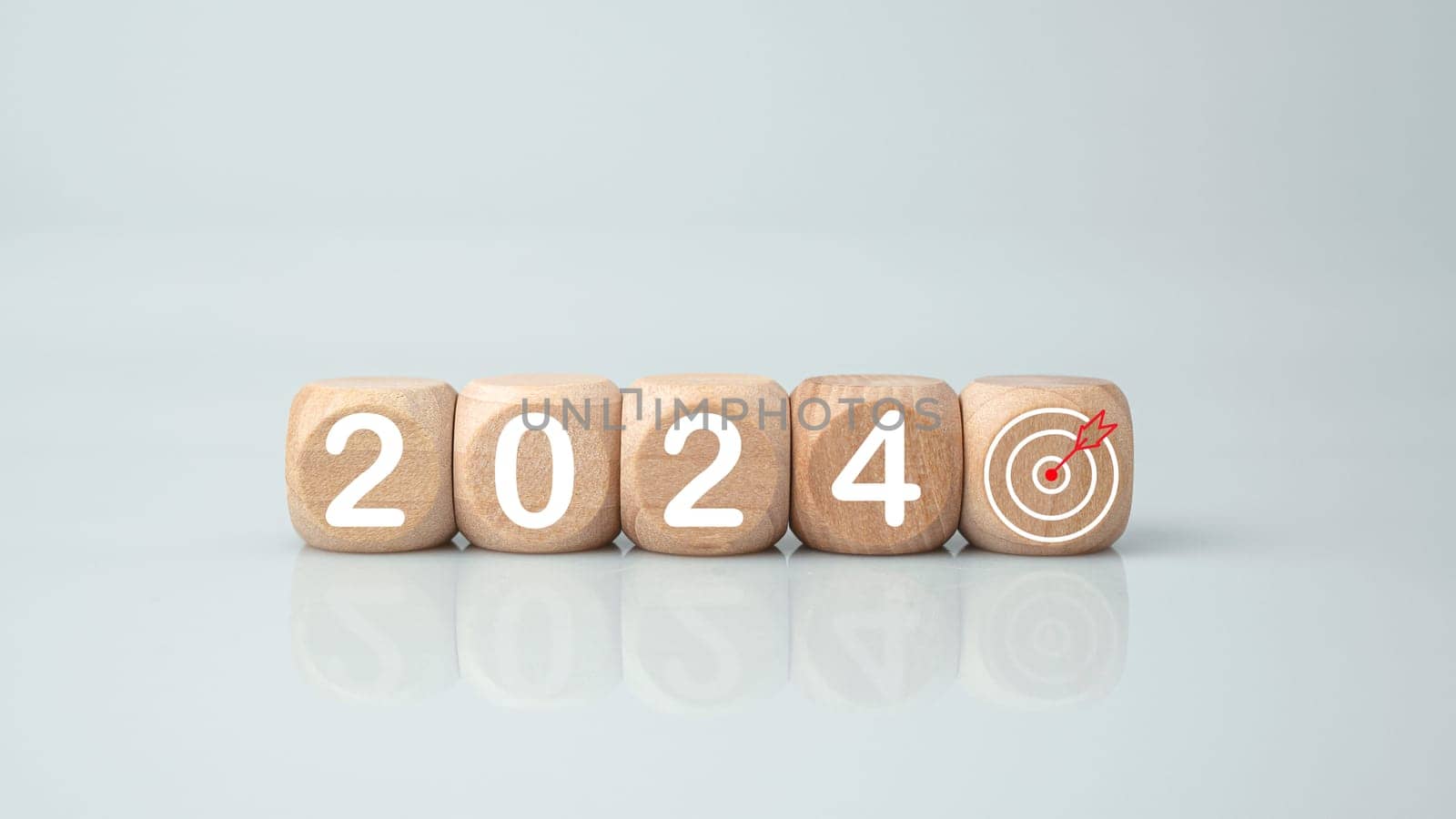 Wooden blocks lined up with the letters 2024. Represents the goal setting for 2024, the concept of a start. financial planning development strategy business goal setting