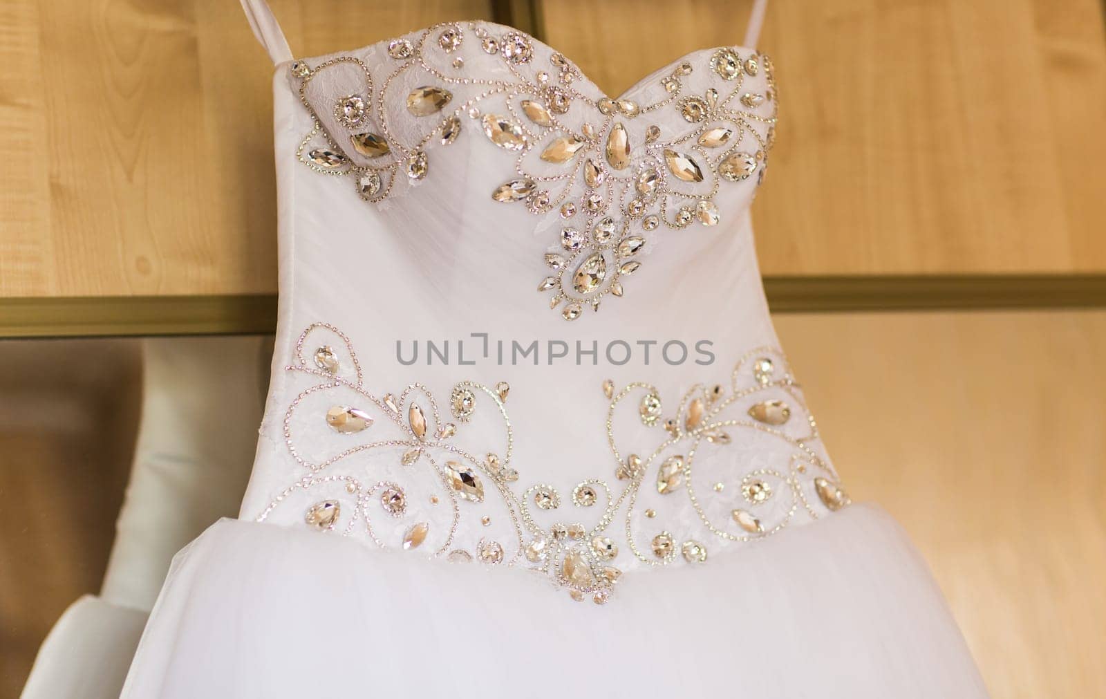 The perfect wedding dress on a hanger in room of bride by Satura86