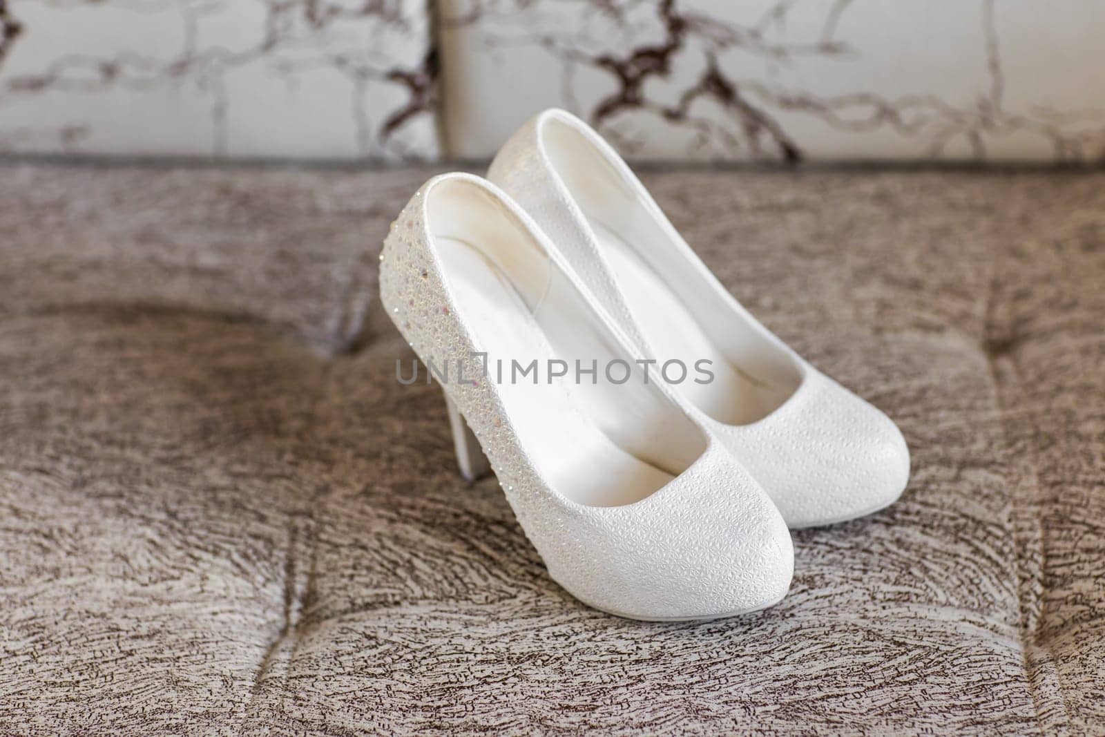 Elegant beautiful white shoes for a bride