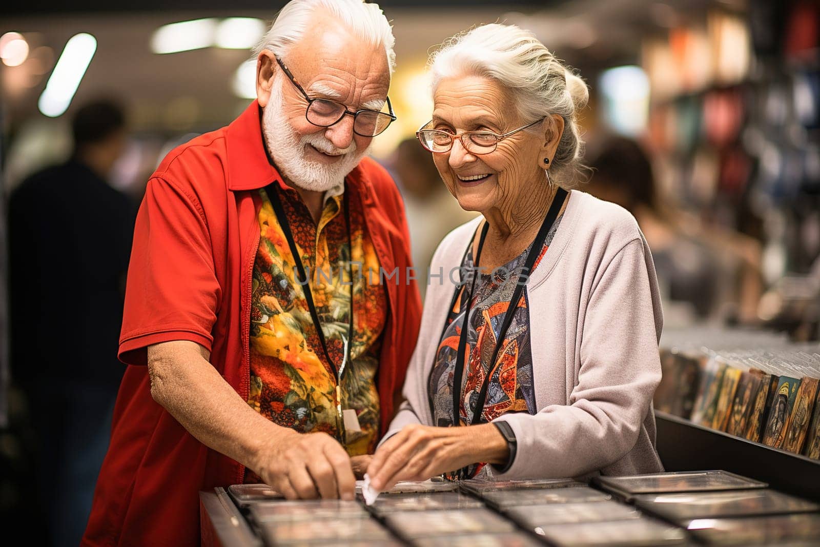 Elderly people looking at souvenirs at a counter at an exhibition. by Yurich32