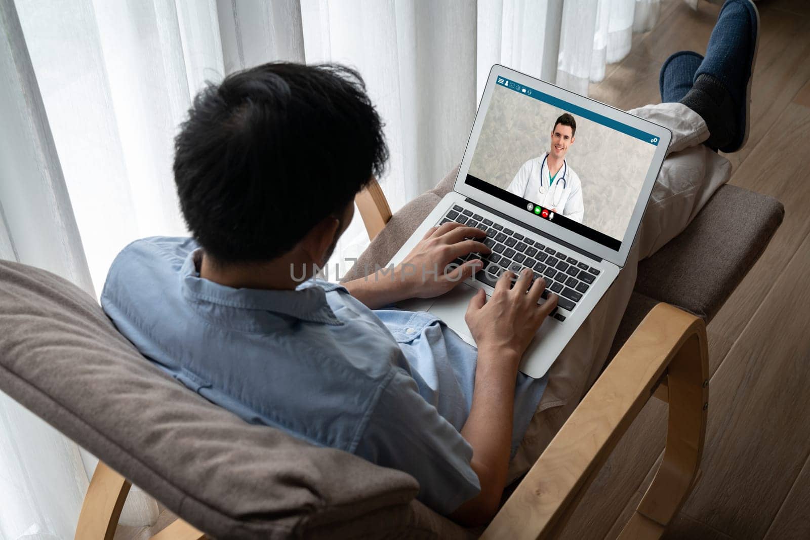 Doctor video call online by modish telemedicine software application for virtual meeting with patient