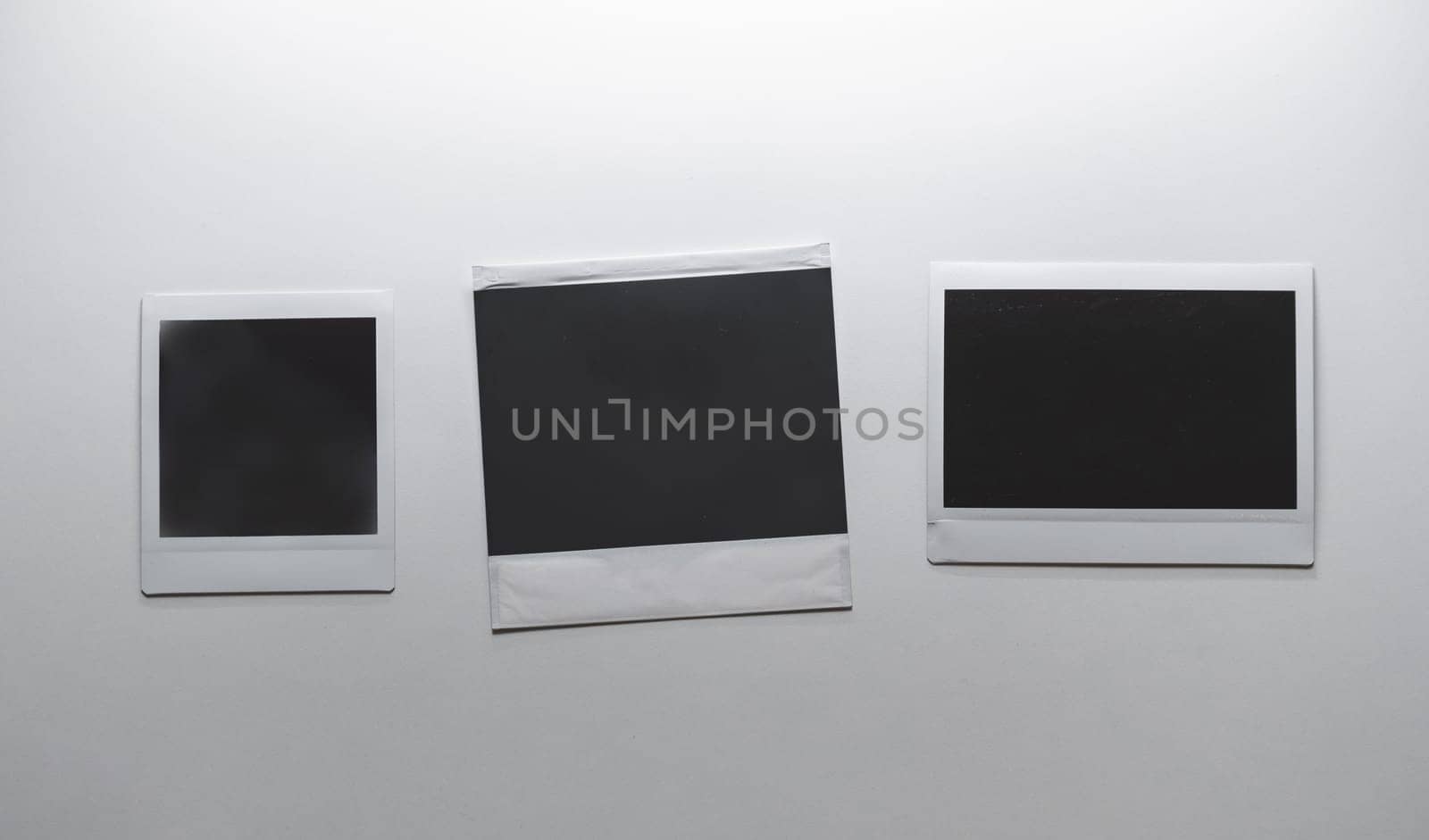 Set of photo frames. Vintage empty photos frame on white wall. Images on wall, retro memory album. White blank square old card for photography memories. art, gallery template download photo