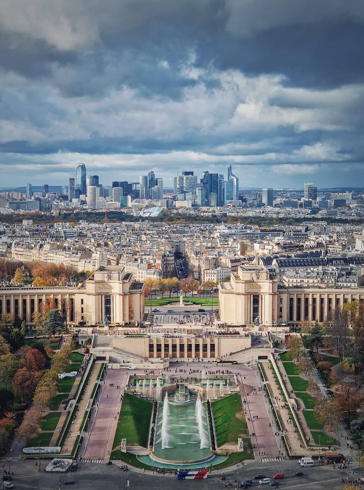 Sightseeing aerial view of the Trocadero area and La Defense metropolitan district at the horizon in Paris, France. Beautiful autumn season colors, vertical background by psychoshadow