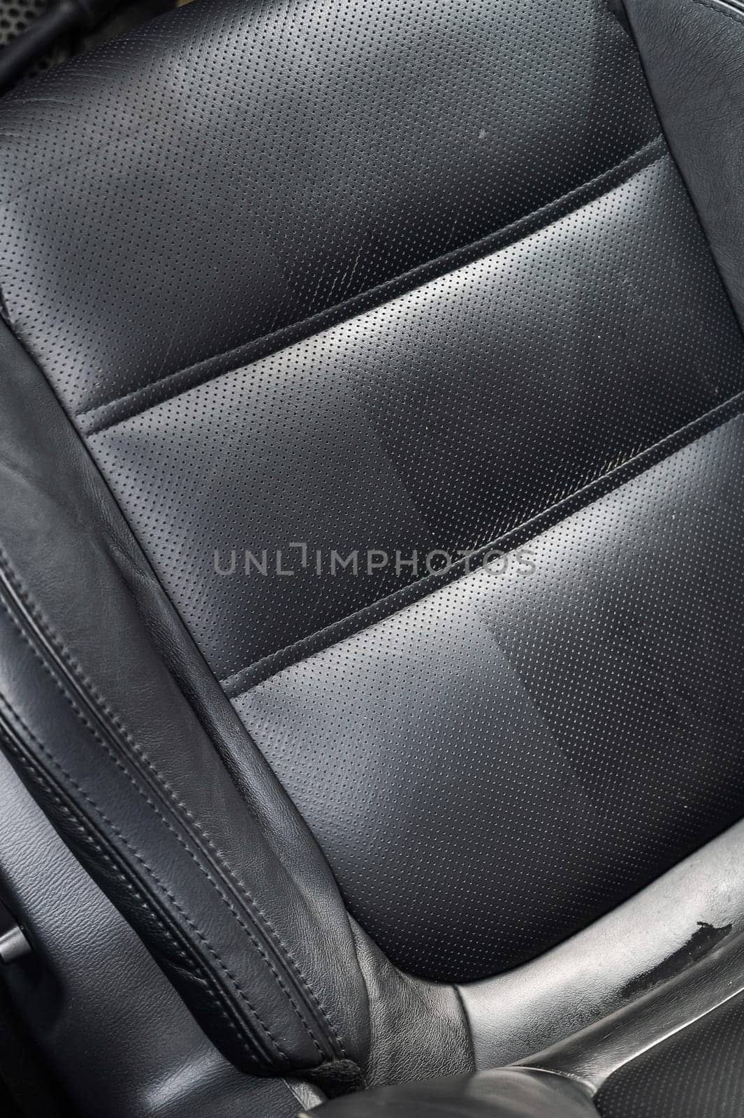 Close-up of black leather car seats