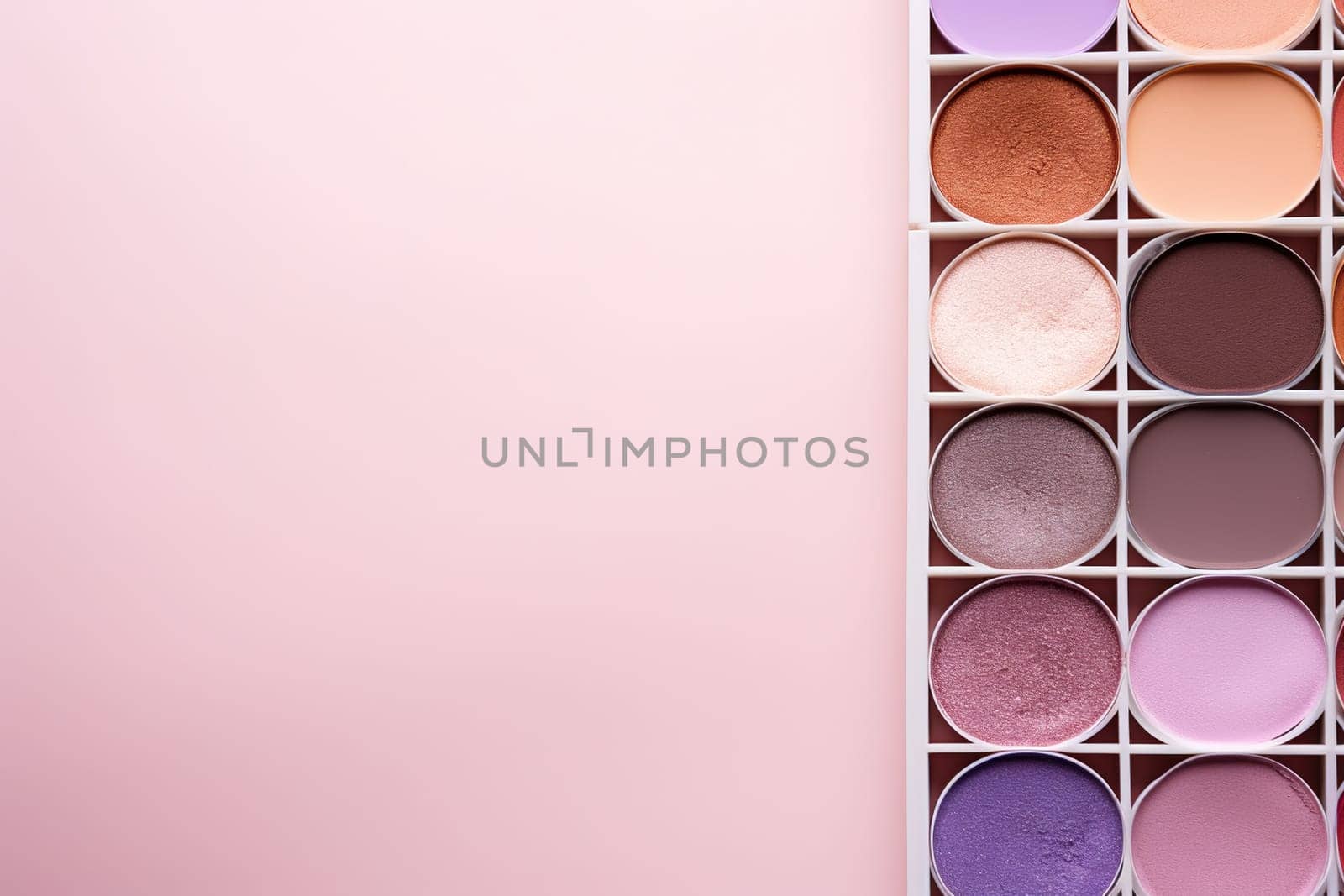 top view mockup cosmetic items with on copy-space pastel colored table