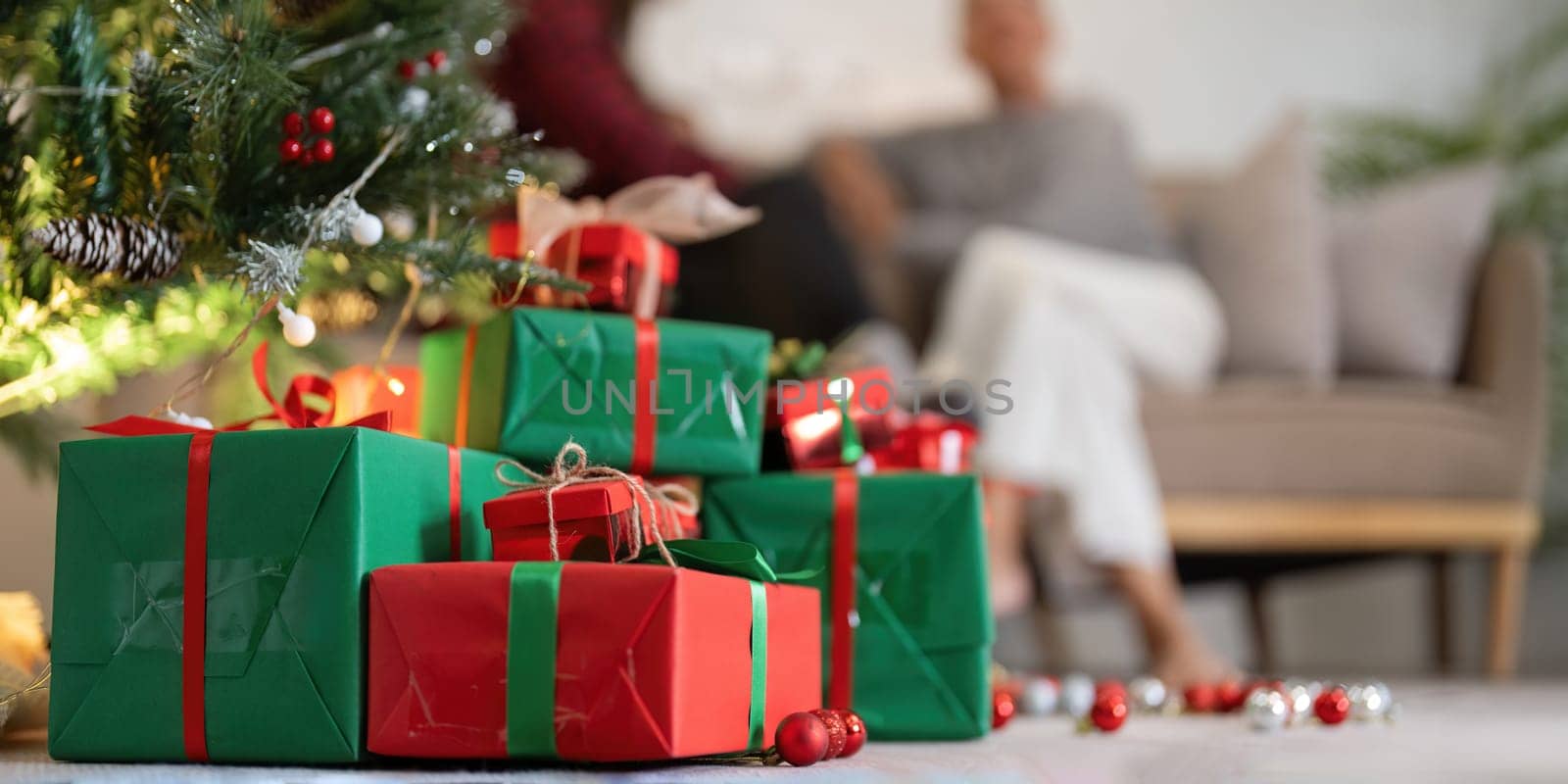 Family winter holiday and concept happy mother and daughter decorate christmas at home.