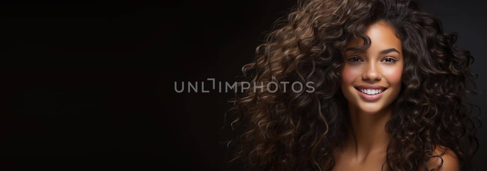 Healthy hair brunette advertisement model. Brunette girl Smiling beautiful model woman with long curly hairstyle. Care and beauty hair products Copy space Beauty