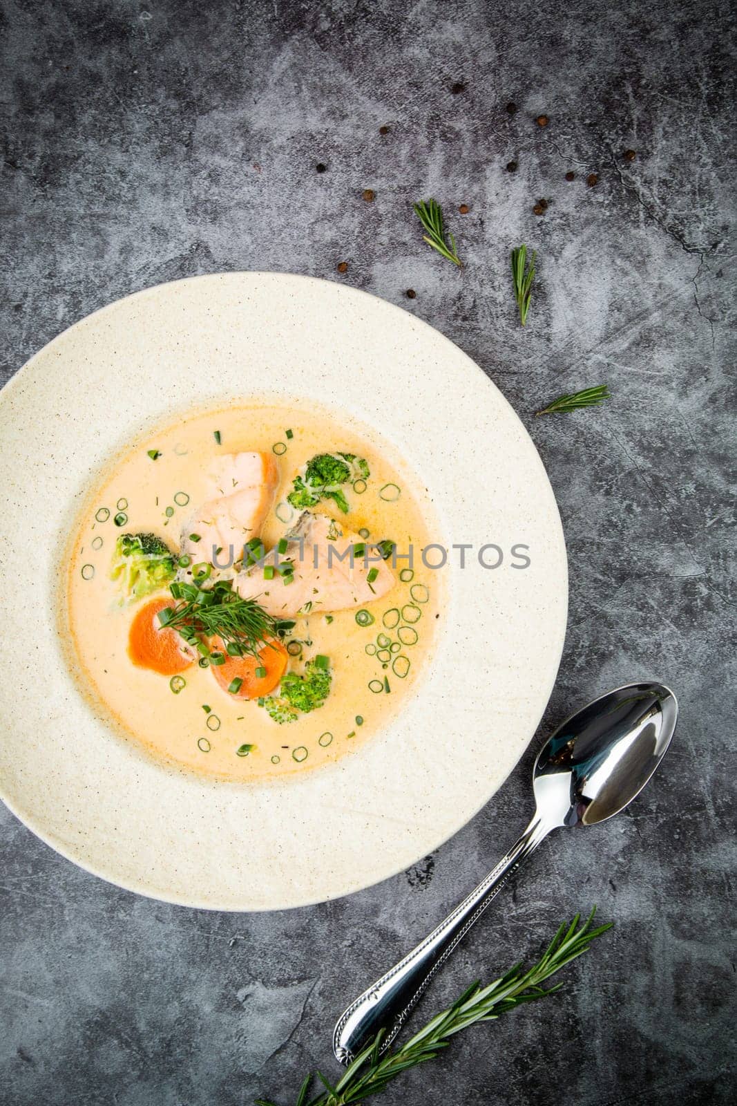 soup with fish, green onions and dill