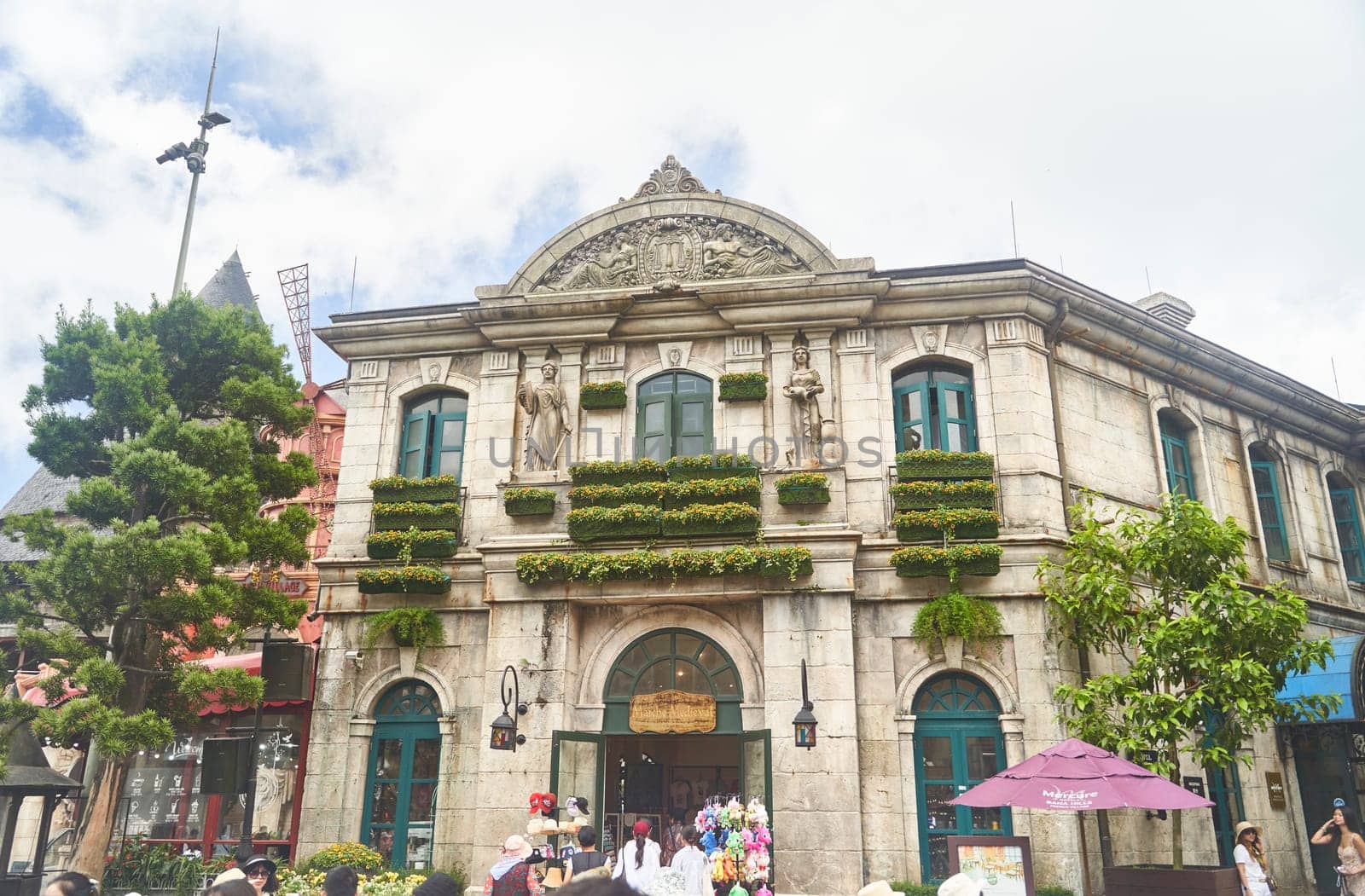 Danang, Vietnam - 29.06.2023: Cozy Streets of the French village Ba Na Hill on the hill. Famous tourist attraction in central Vietnam. High quality photo