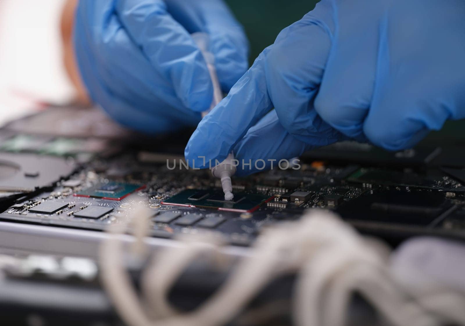 Cpu microchip processor with thermal paste. Motherboard device or electric cpu to repair cpu using thermal paste concept