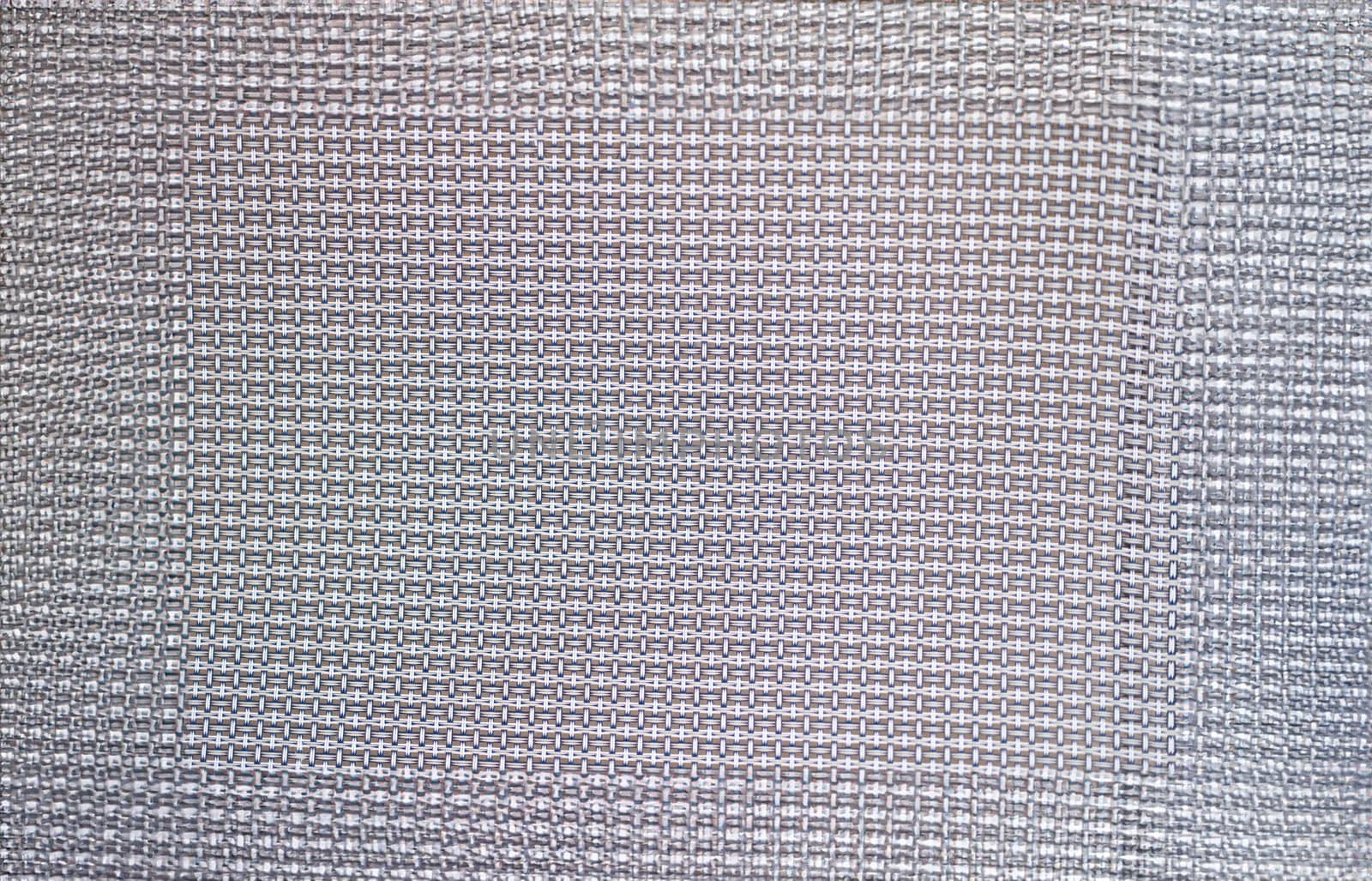 Gray background with interlacing horizontal and vertical stripes closeup