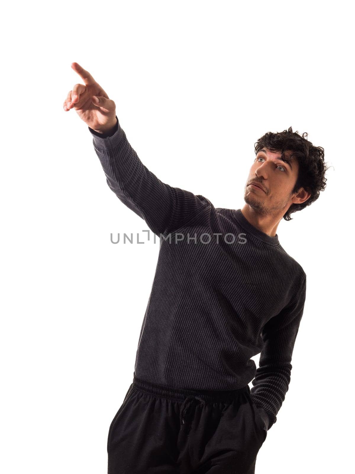 A Man in a Black Sweater Pointing at Something by artofphoto