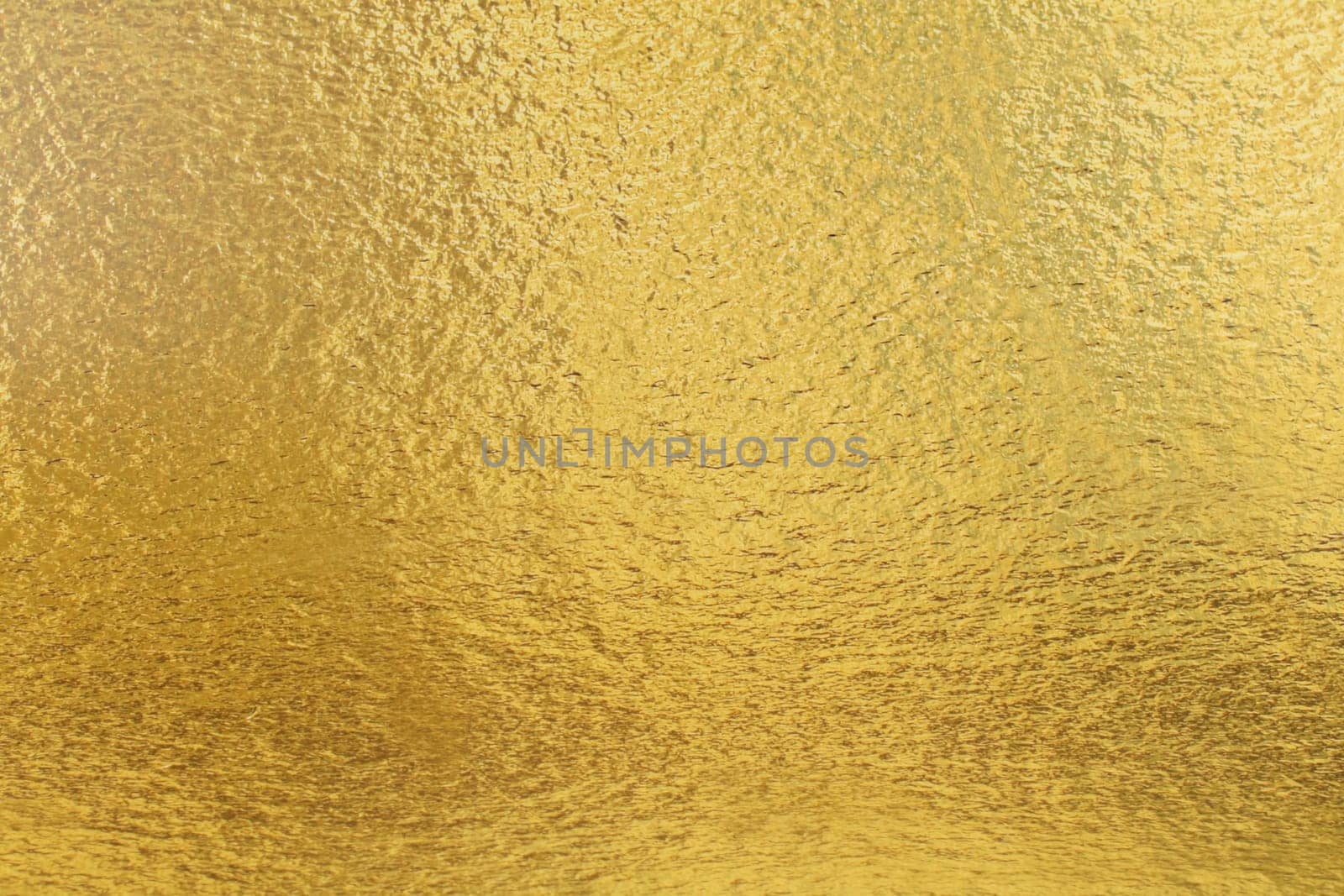 Texture of gold. Golden iridescent festive and expensive background. by Sviatlana
