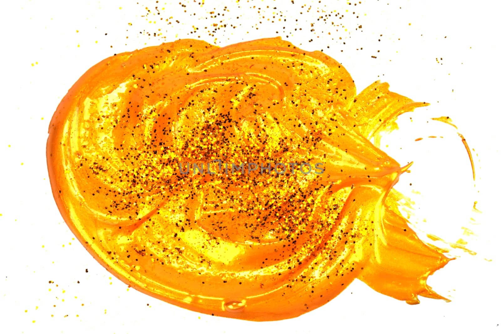 Cosmetic gold spot. Gold glitter paint swatch isolated on white background