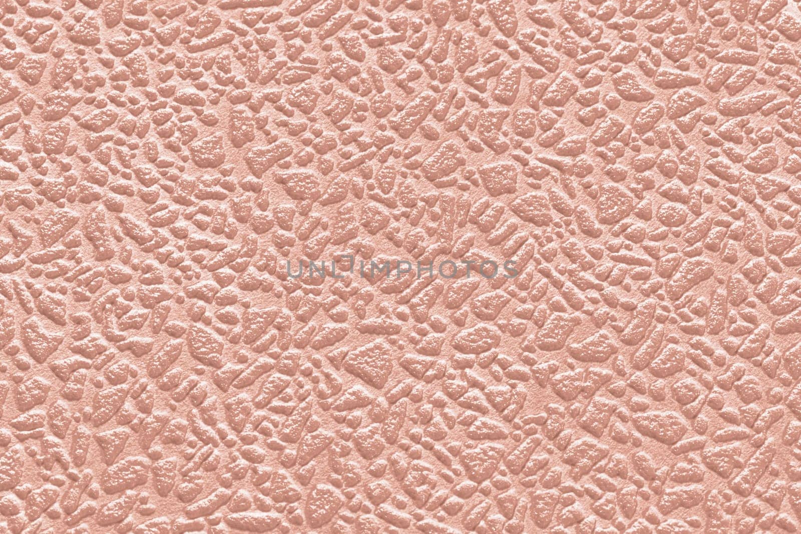 Light beige texture background of paper wallpaper with uneven pimples.