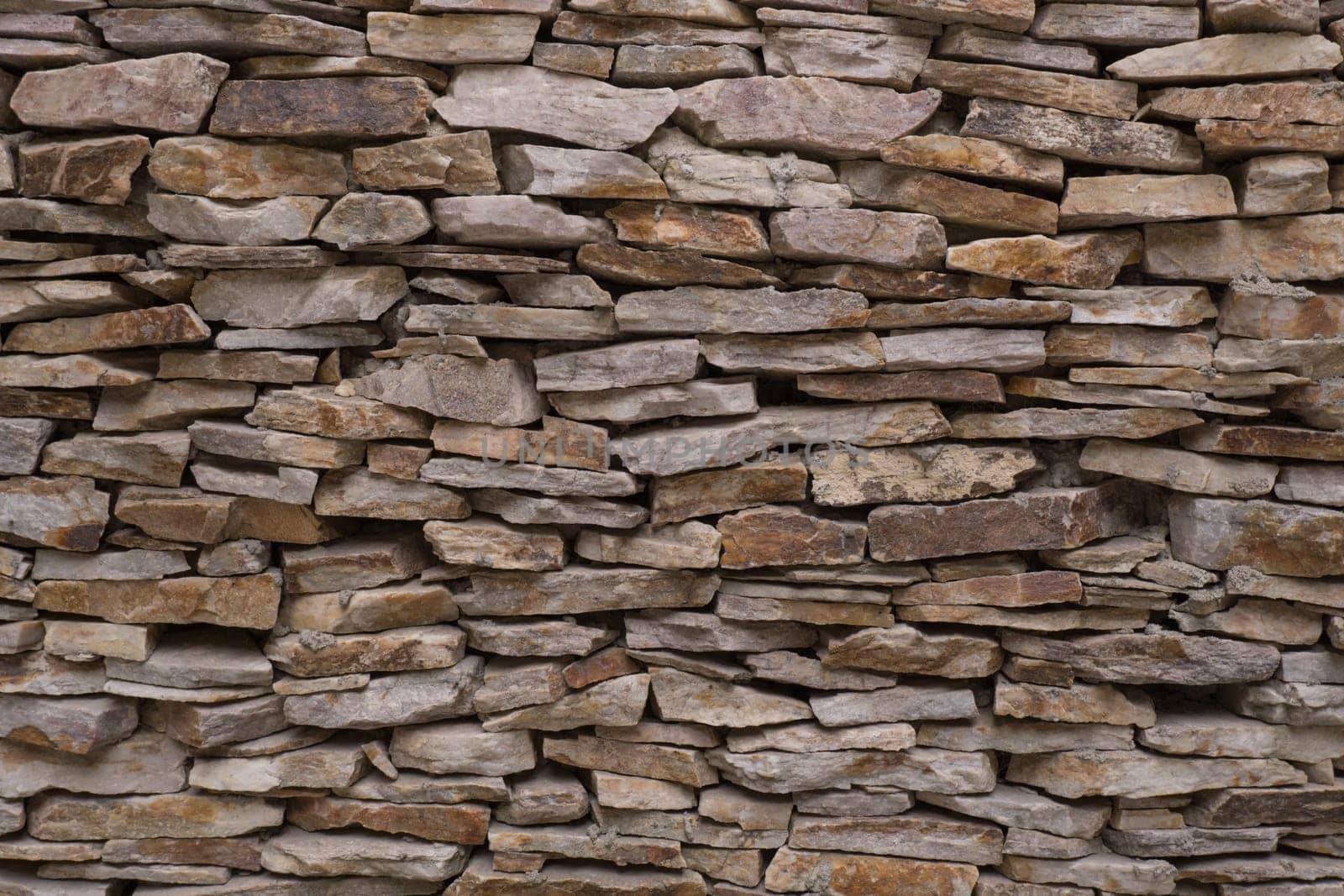 Old brown brick wall pattern. Stone background