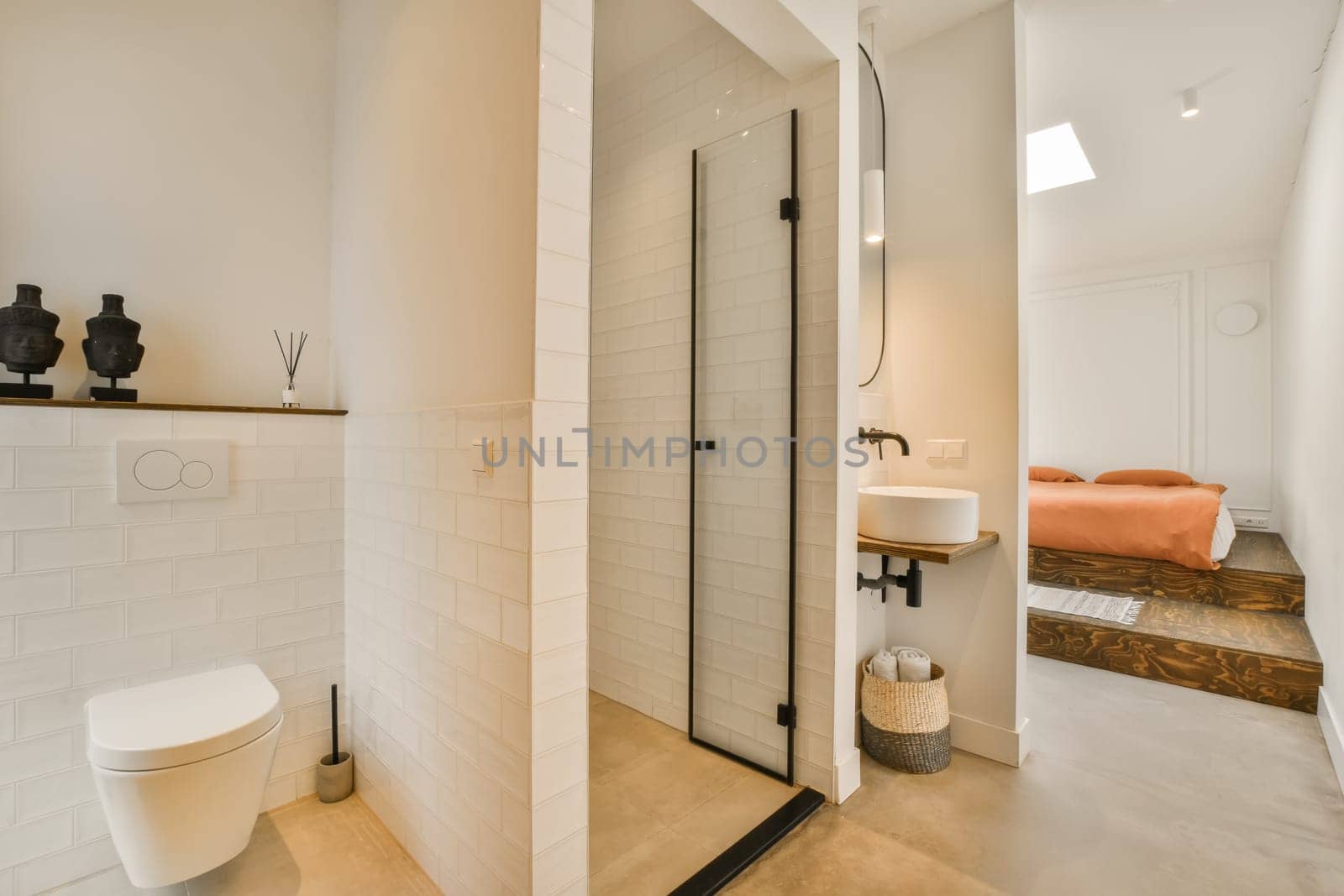 a white bathroom with a toilet and a shower by casamedia