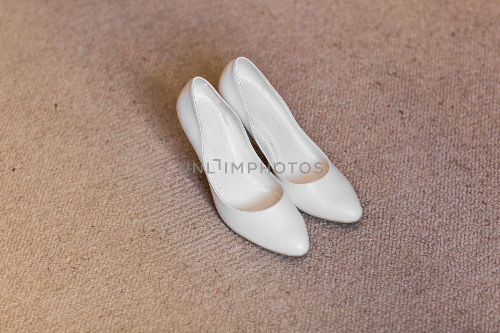 Elegant beautiful white shoes for a bride