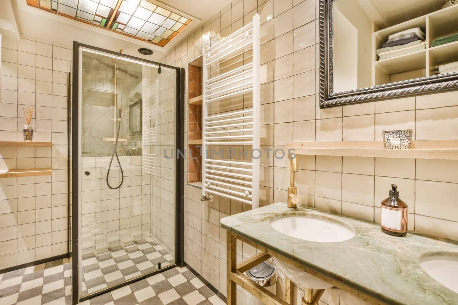 a bathroom with a sink and a shower by casamedia