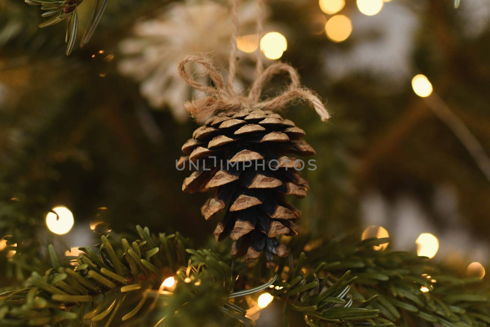 Cone toy hanging on the christmas tree