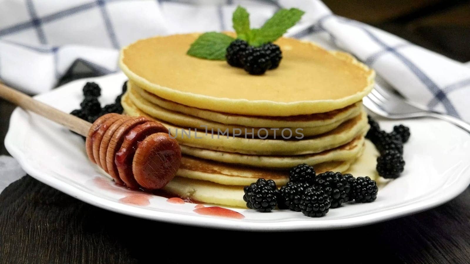 Pancakes with fresh blackberries by homydesign