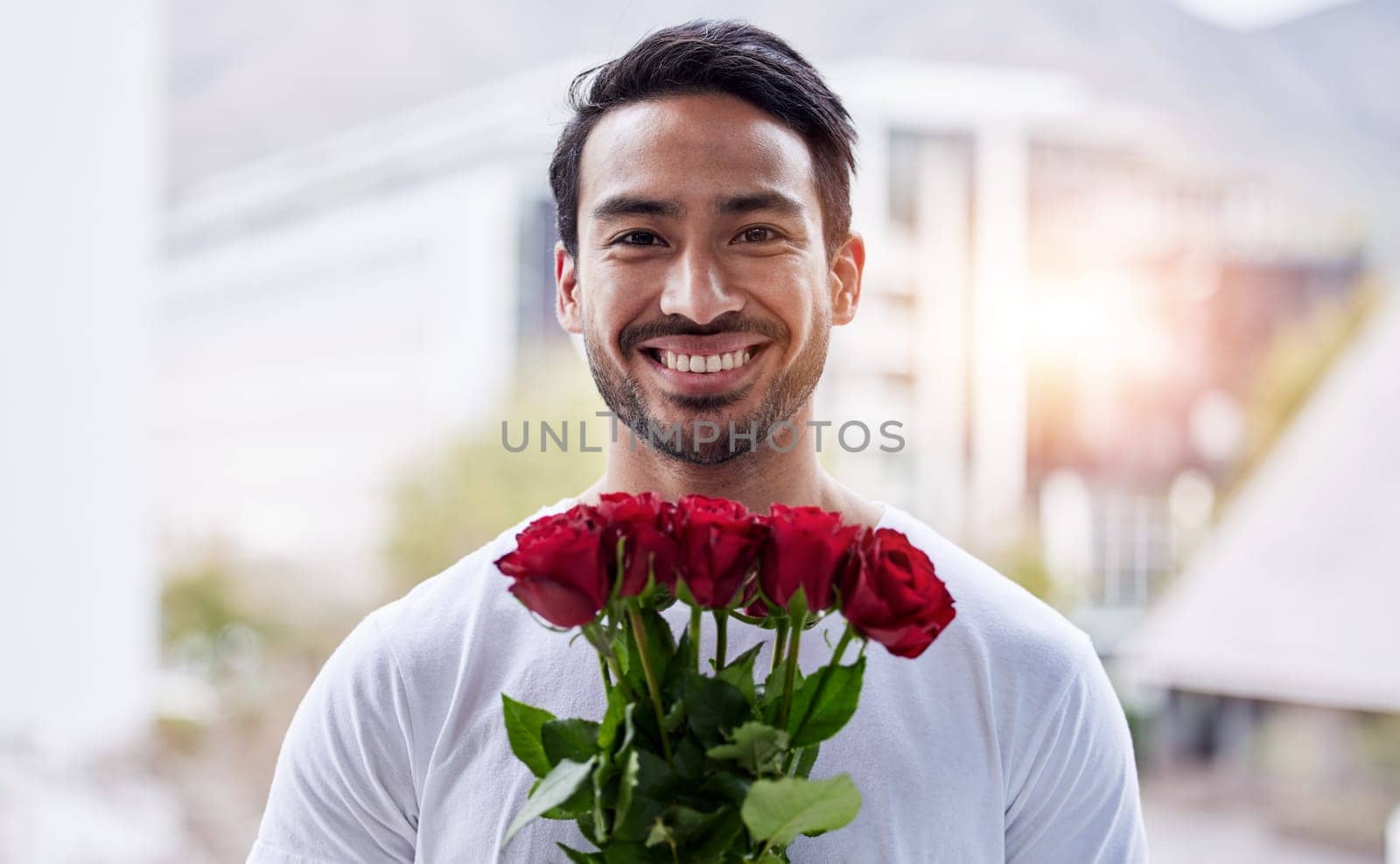 Smile, portrait and happy man with bouquet of roses for date, romance and hope for valentines day. Love confession, romantic gift and person holding flowers outside in city for proposal or engagement by YuriArcurs