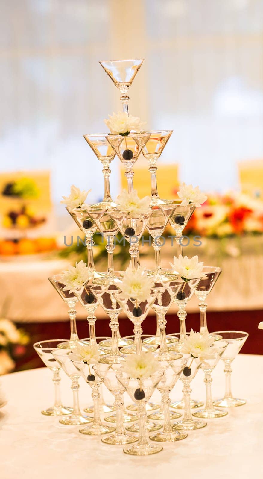 Pyramid of champagne glasses. by Satura86