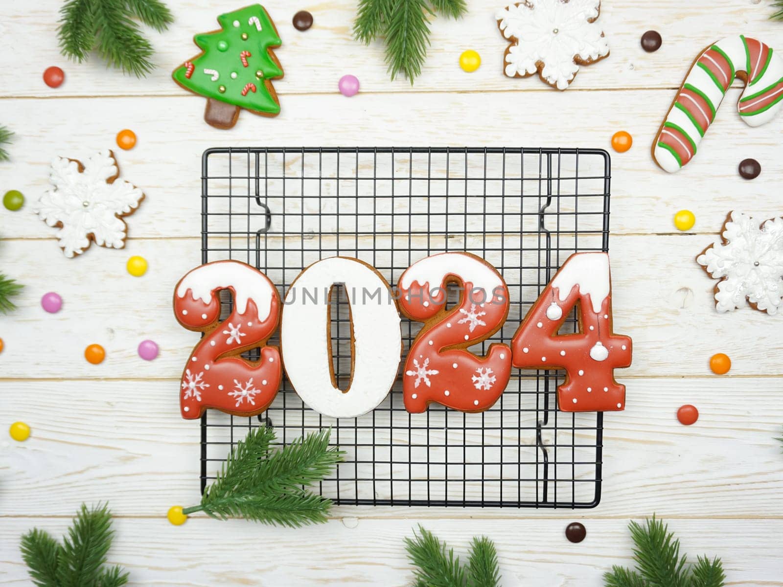 The numbers 2024 from gingerbread. New Year's background. Christmas dessert. by Spirina