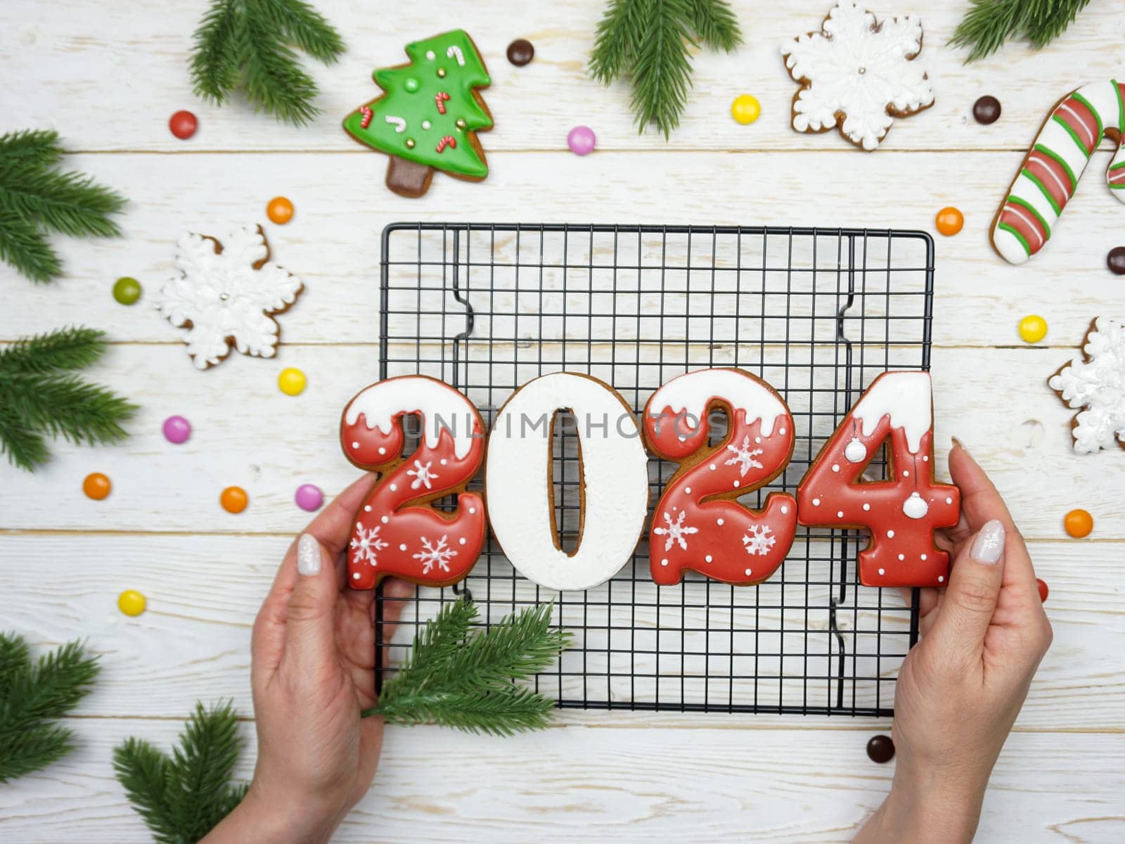 The numbers 2024 from gingerbread. New Year's background. Christmas dessert. by Spirina