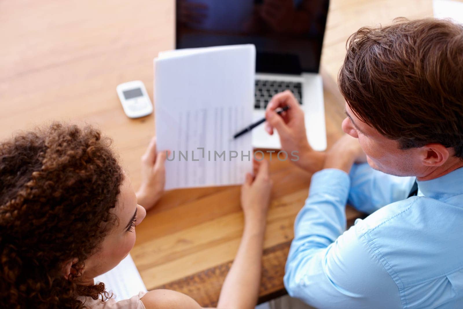 Document, discussion and business people in collaboration in the office planning a legal agreement. Professional, paperwork and top view of team of lawyers in conversation with contract in workplace