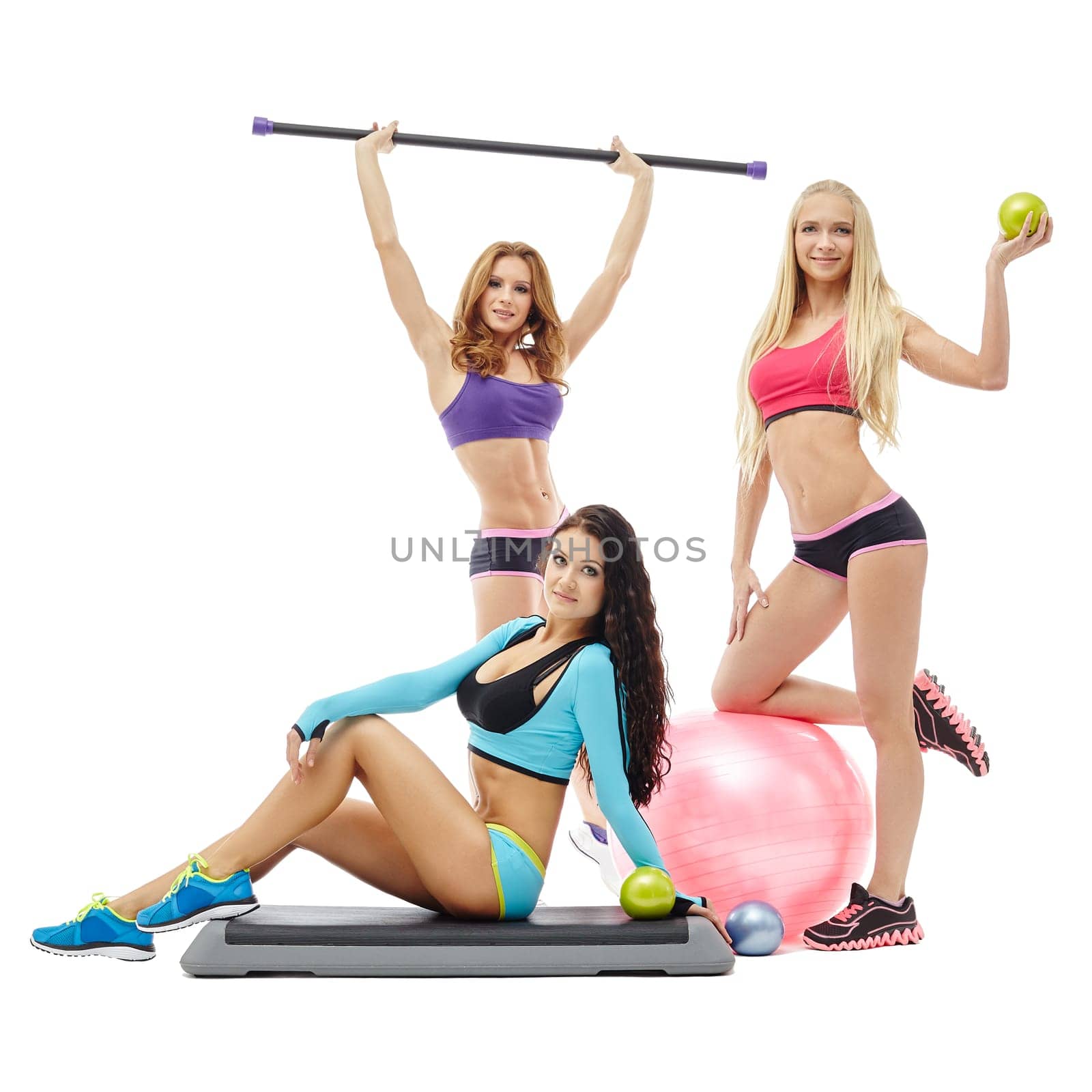 Charming young women posing with sports equipment by rivertime