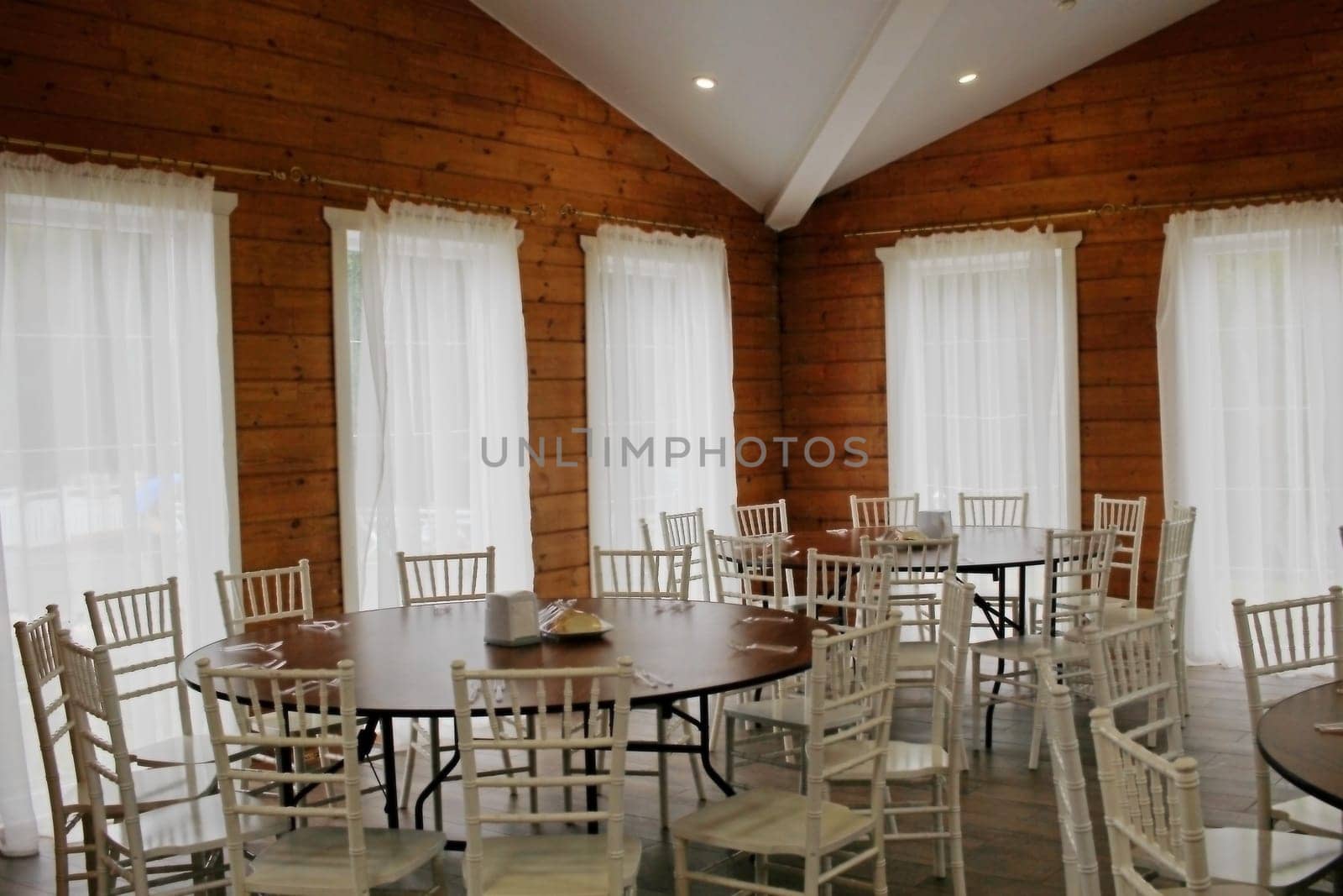 Photo tables and chairs in a cafe Canteen Eating by electrovenik
