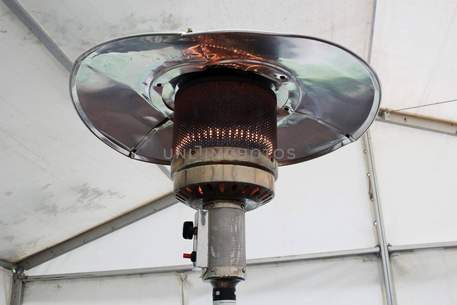 Photo heater gas burner. Heating outside, in a tent.