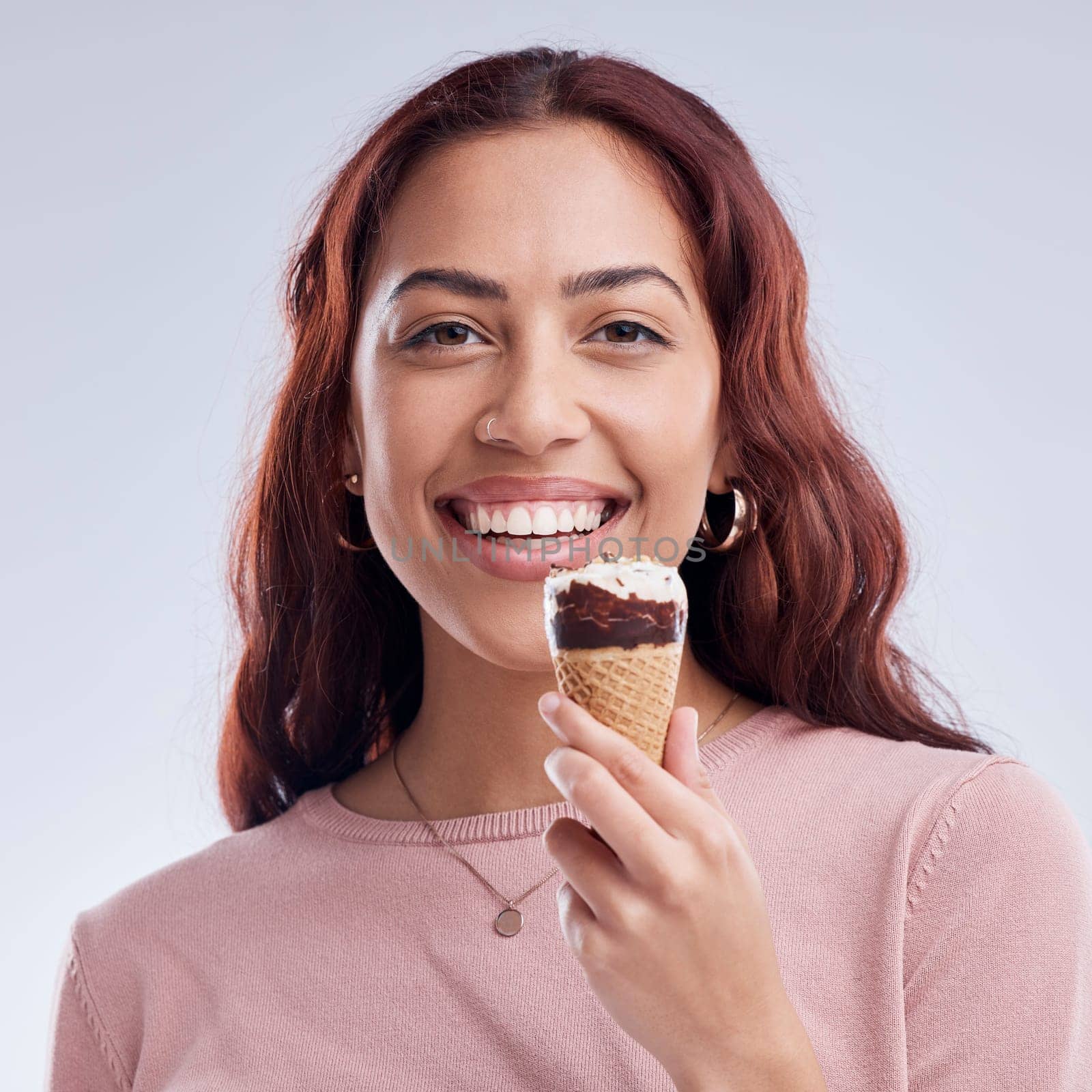 Happy, ice cream and portrait of woman with smile in studio with dessert, snack and sweet treats. Food, style and face of female person with cone for eating, luxury and summer on gray background.