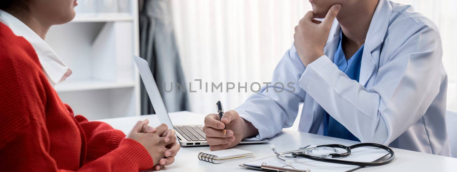 Laptop display medical report on blurred doctor office. Rigid by biancoblue