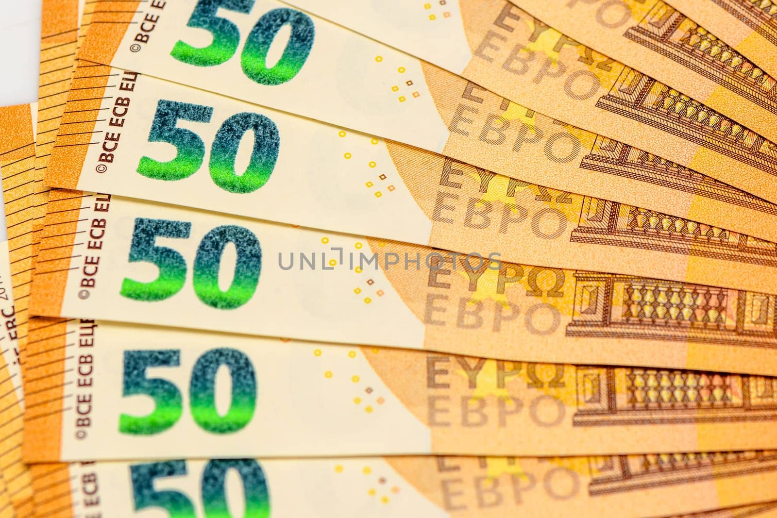 50 euro bills on white background fanned out 9 by Mixa74