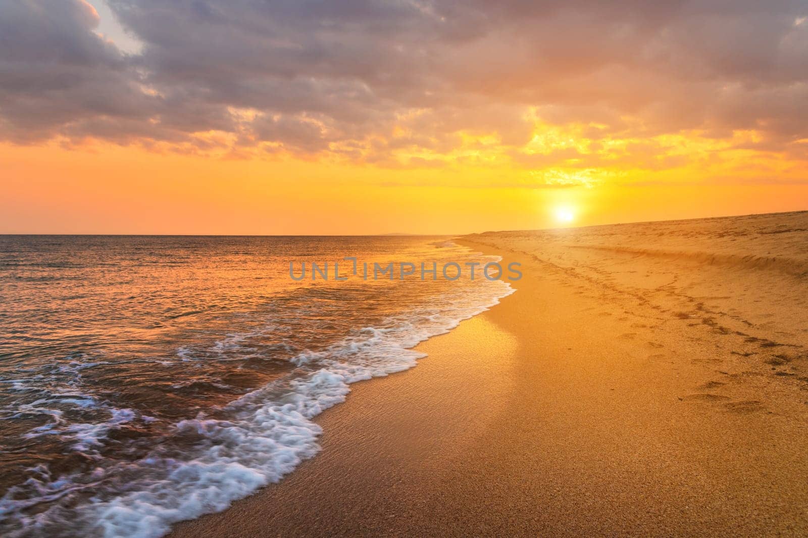 Closeup sea sand beach. Panoramic beach landscape. Inspire tropical beach seascape horizon. Orange and golden sunset sky calmness tranquil relaxing sunlight summer mood by yanik88
