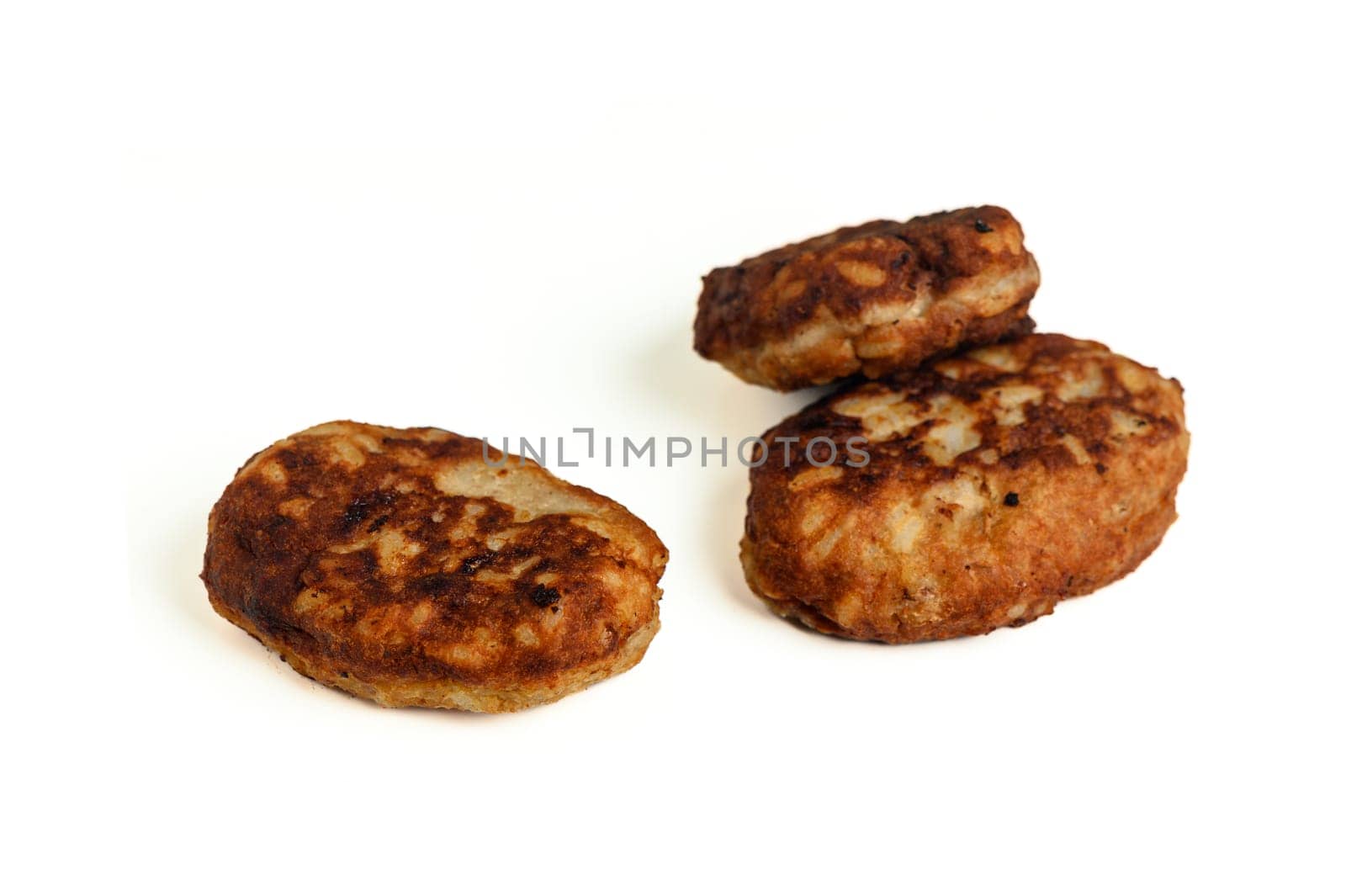 Appetizing fresh Fish cutlets on a white background