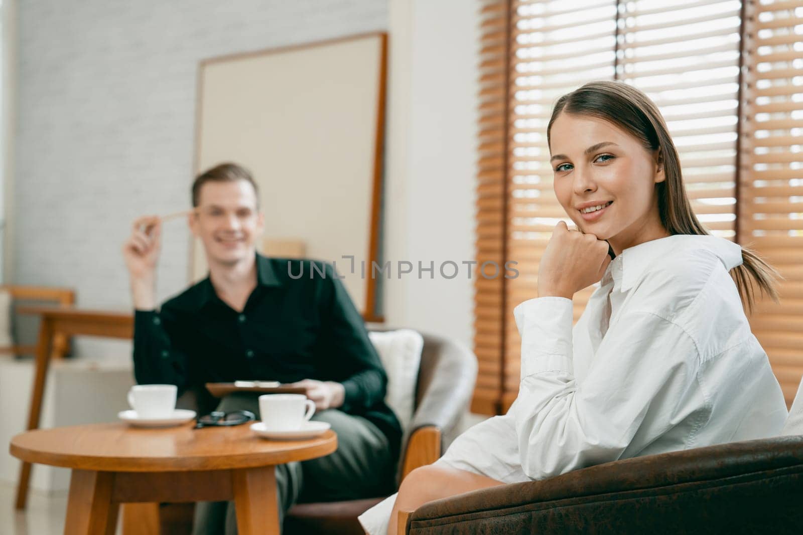 Psychological consultation gaining improvement on mental problem, happy young female patient doing therapy session while psychiatrist making diagnostic on mental illness. Unveiling