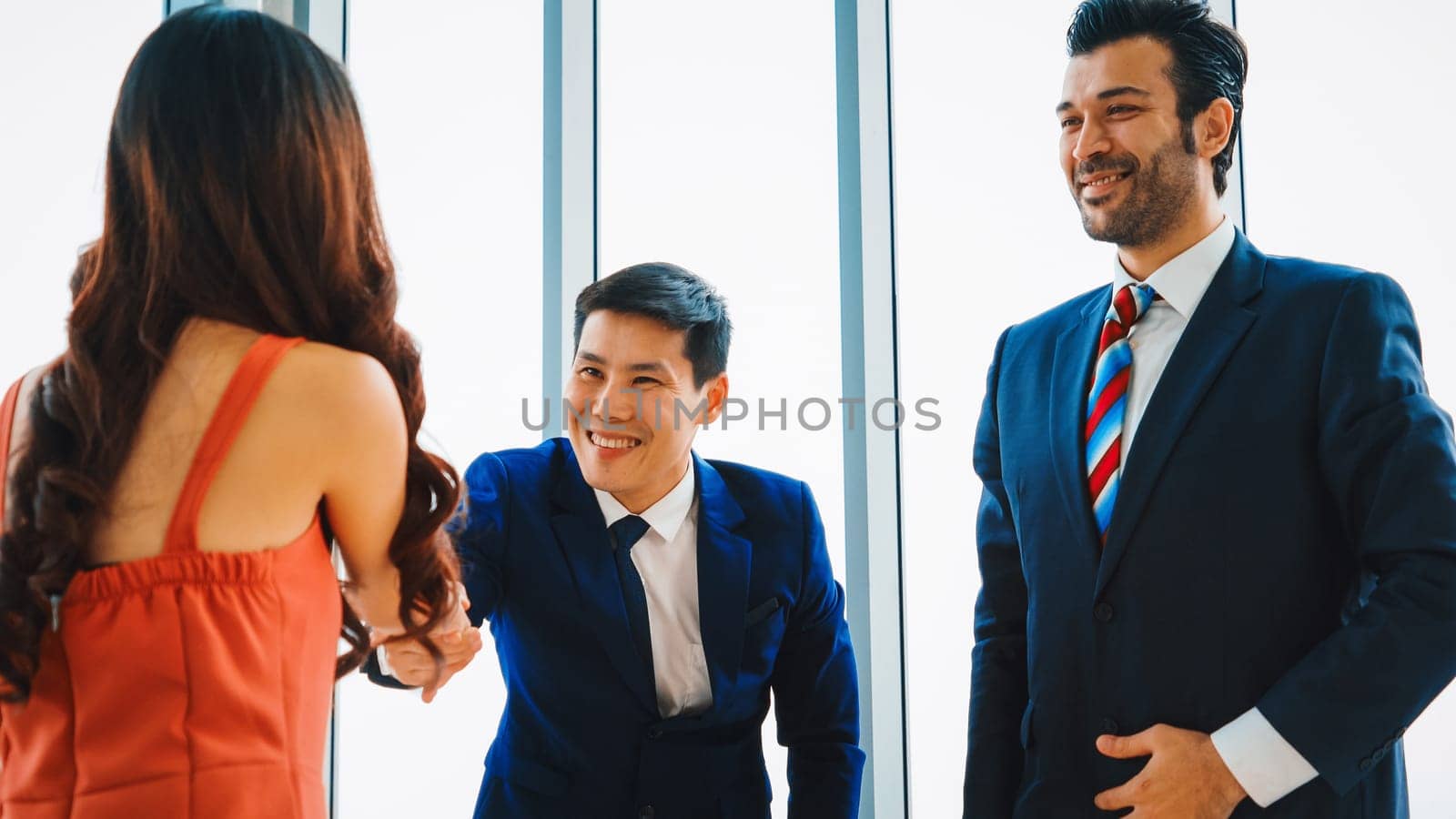 Job seeker and manager handshake in job interview meeting at corporate office. The young interviewee seeking for a professional career job opportunity . Human resources and recruitment concept. Jivy