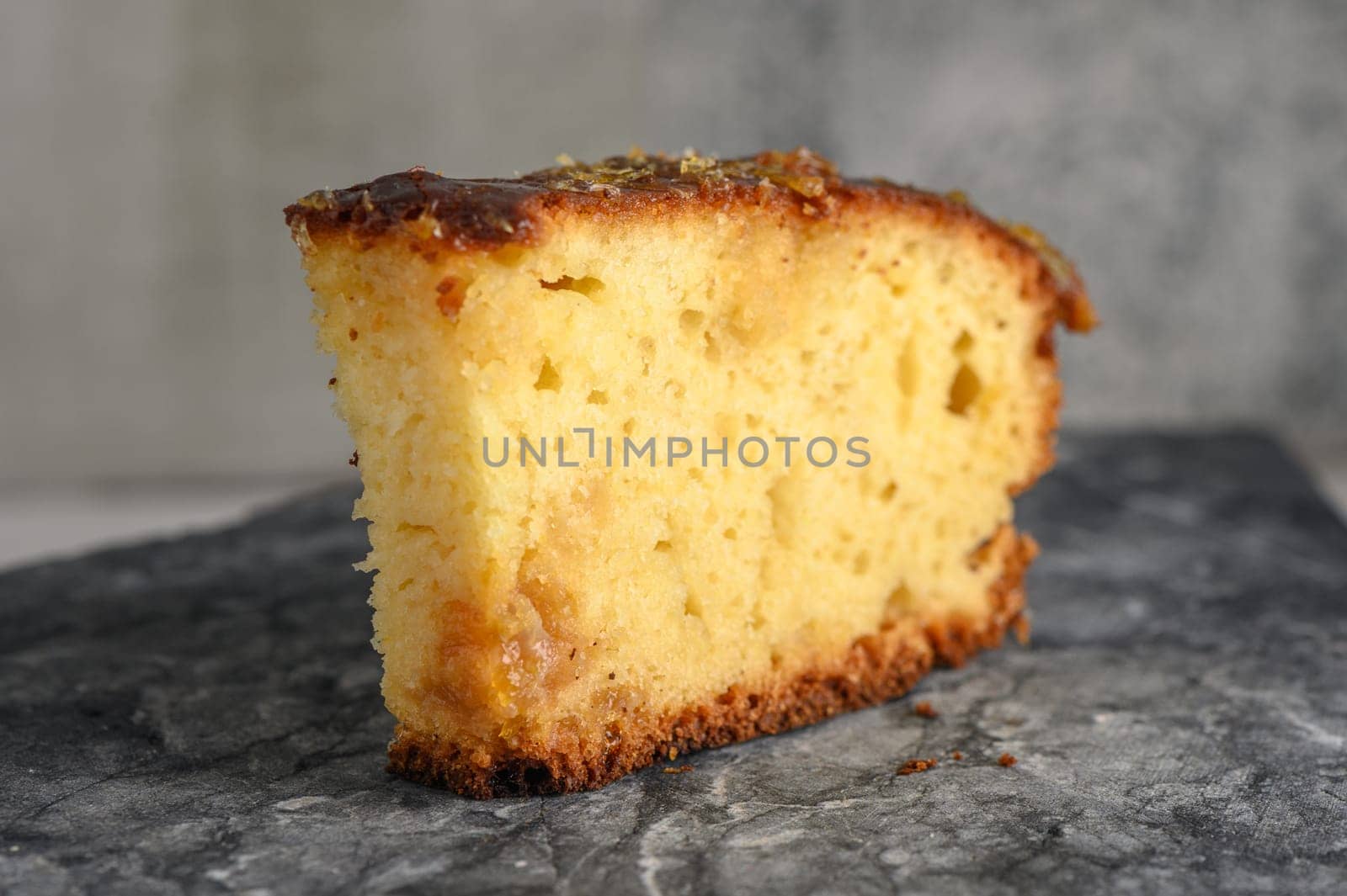 piece of pie with orange jam on a stone kitchen surface 2