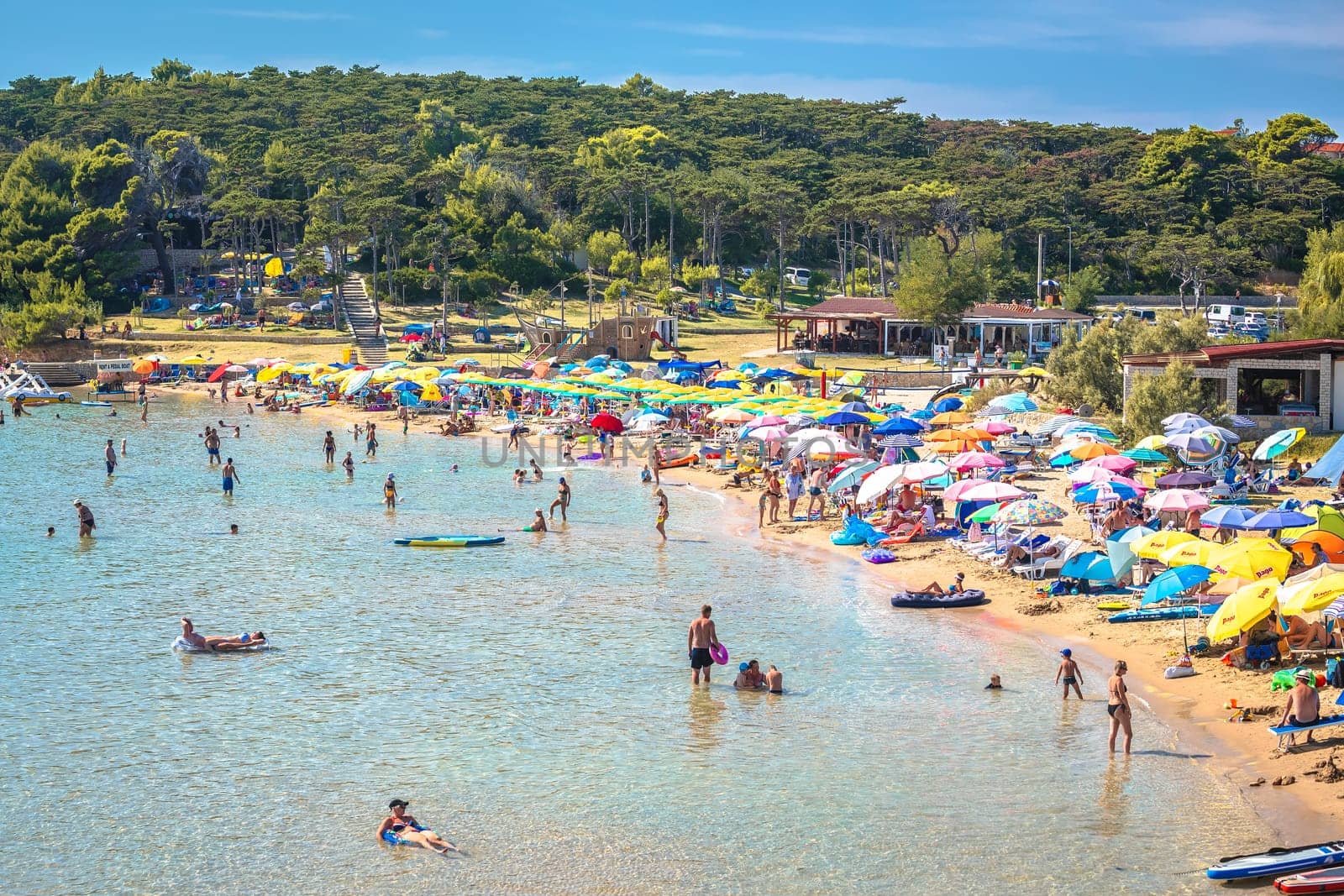 Lopar, Rab, August 24 2023: San Marino Heaven beach in Lopar on Rab island scenic view, archipelago of Croatia. Famous tourist spot.