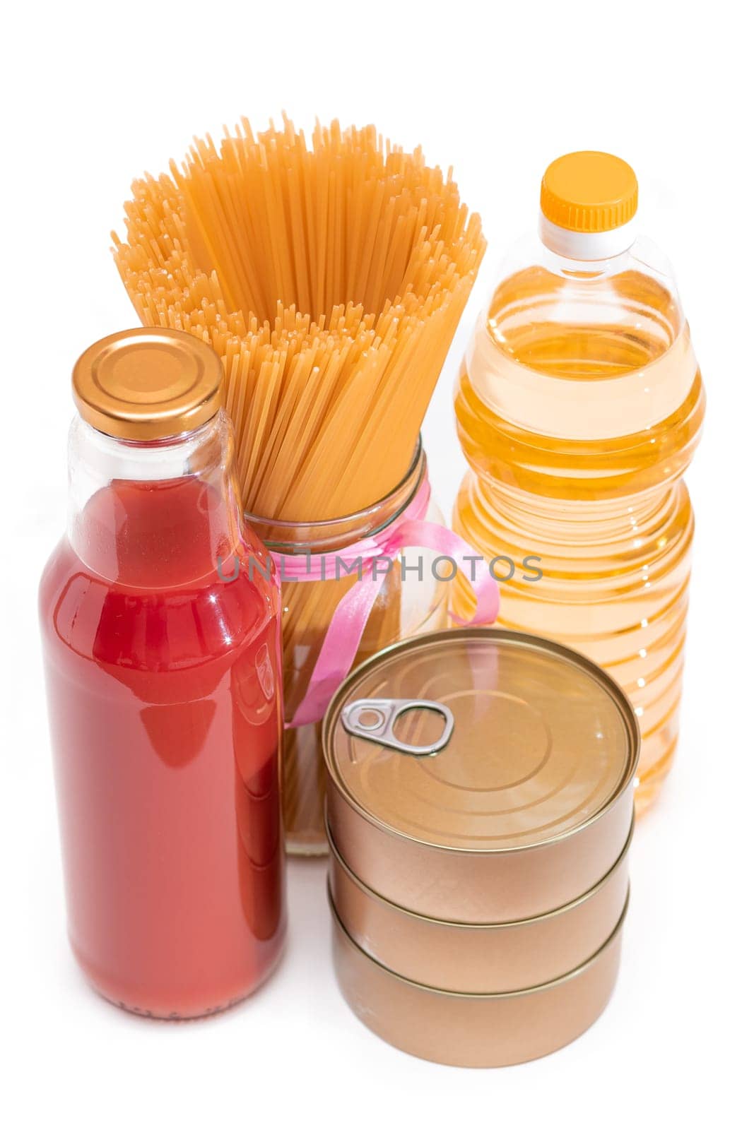 Food Reserves: Canned Food, Spaghetti, Tomato Juice, Pasta and Grocery - Isolated on White Background. Emergency Food Storage in Case of Crisis. Strategic Food Supplies - Isolation