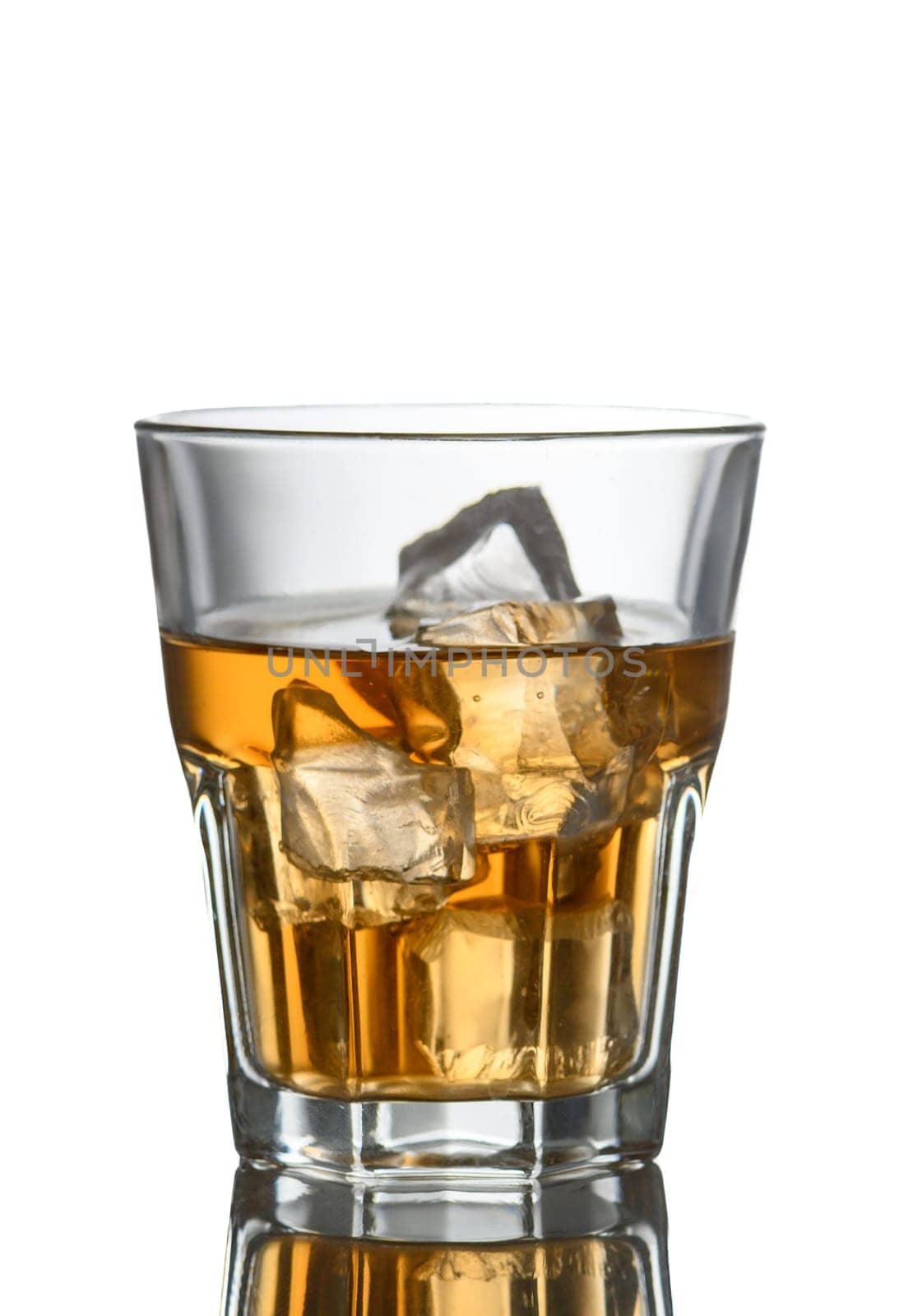 glass of alcohol and cube ice on white background by Mixa74