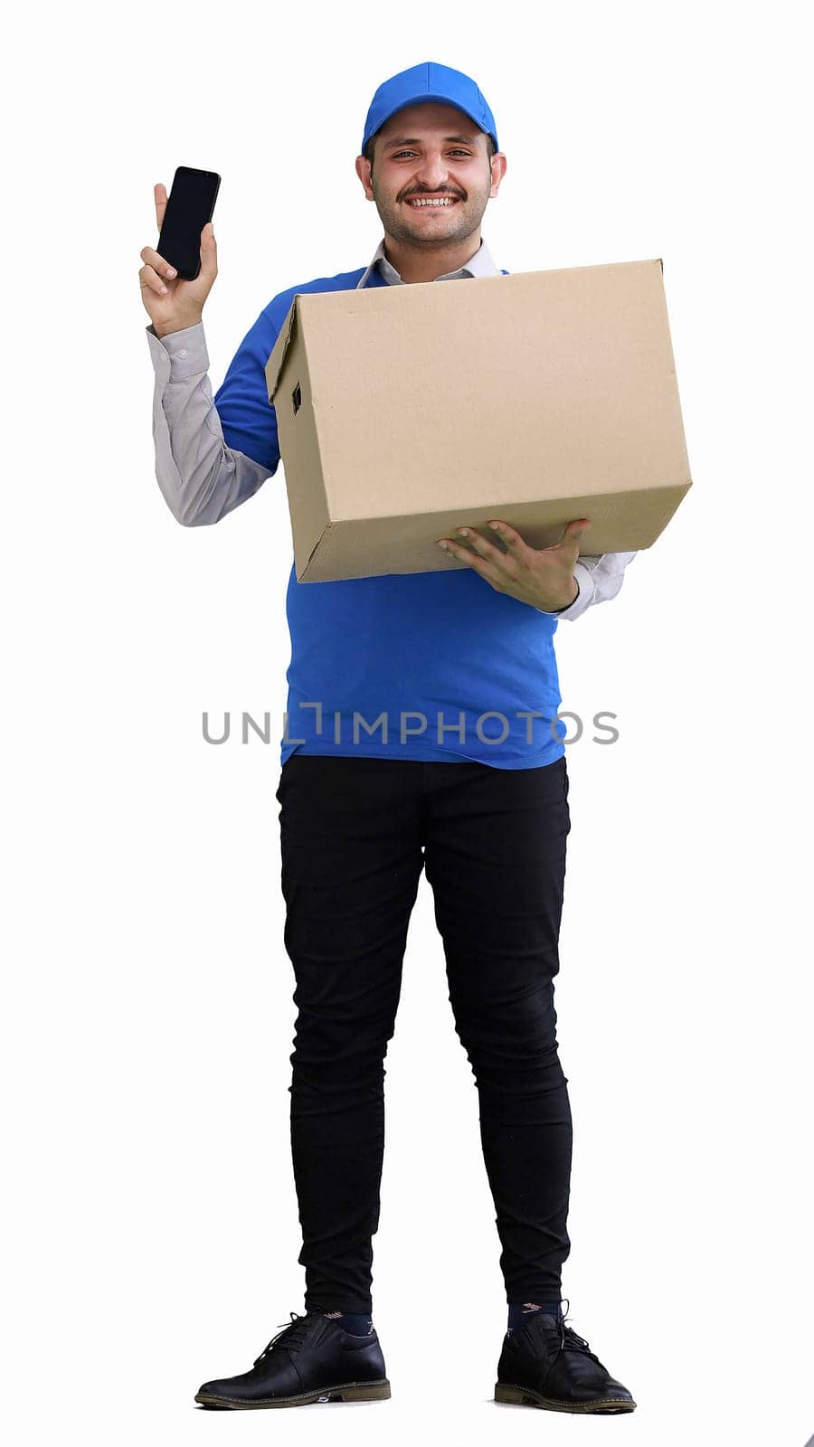 full-length male courier holding a box on a green background by Prosto